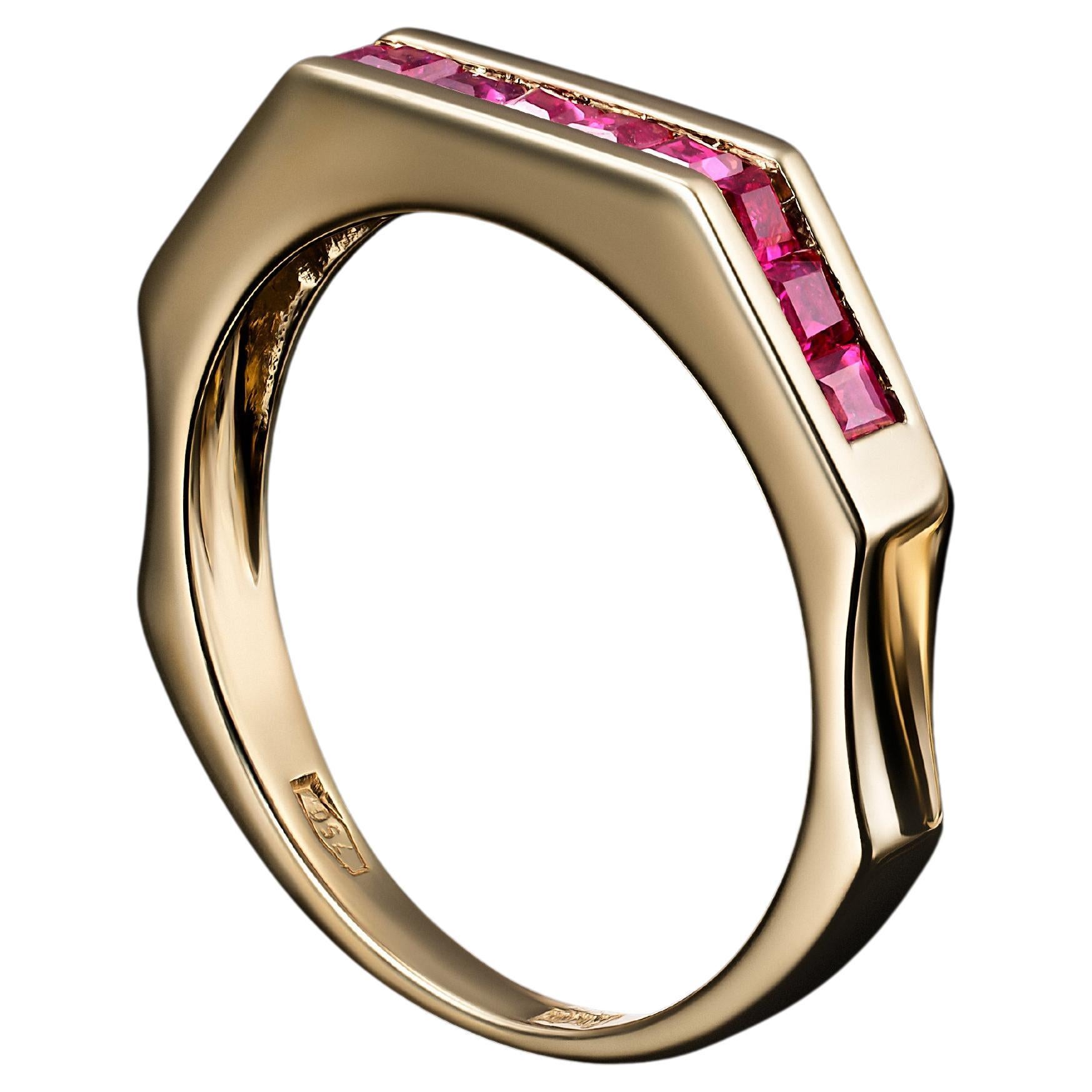 A gorgeous Art Deco-styled ring set with Burmese rubies, manufactured in the early 1990's by Italian master artisans. 

Meticulously hand-made, this 18k yellow gold ring exudes timeless sophistication. Geometric balance in the form of delicate