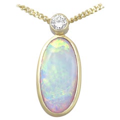 Vintage 1990s 2.12 Carat Opal and Diamond Yellow Gold Pendant