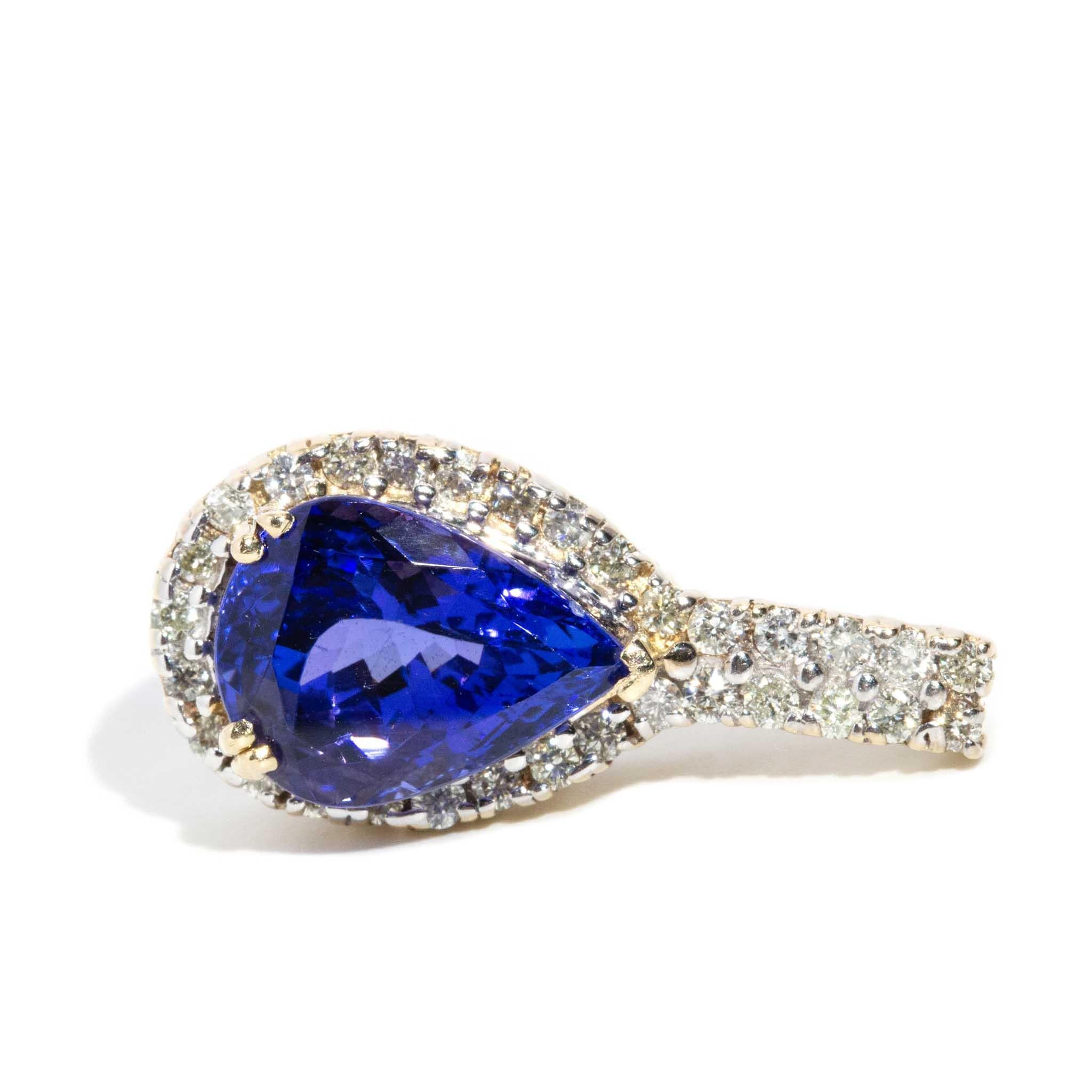 Modern Vintage 1990s 7.1 Carat Purplish Blue Tanzanite & Diamond Pendant 14 Carat Gold