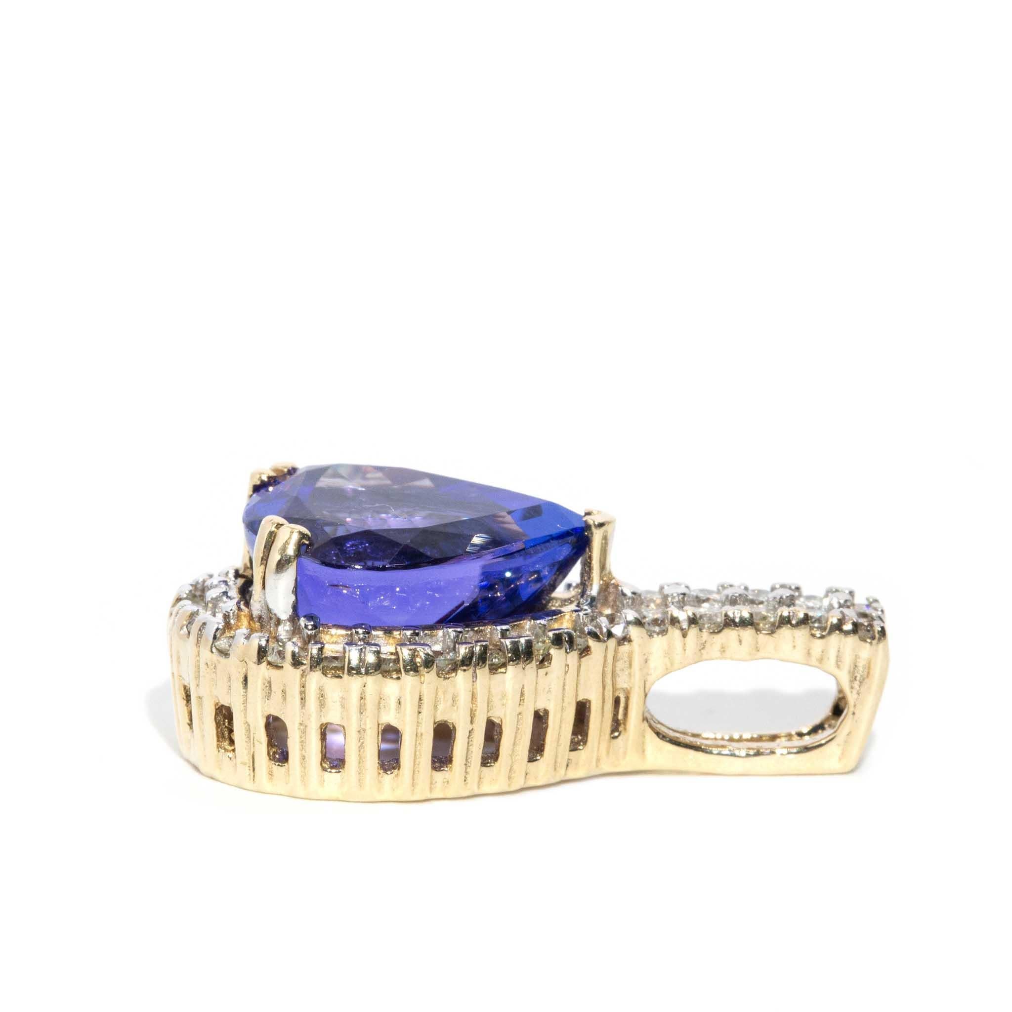 Vintage 1990s 7.1 Carat Purplish Blue Tanzanite & Diamond Pendant 14 Carat Gold In Good Condition In Hamilton, AU