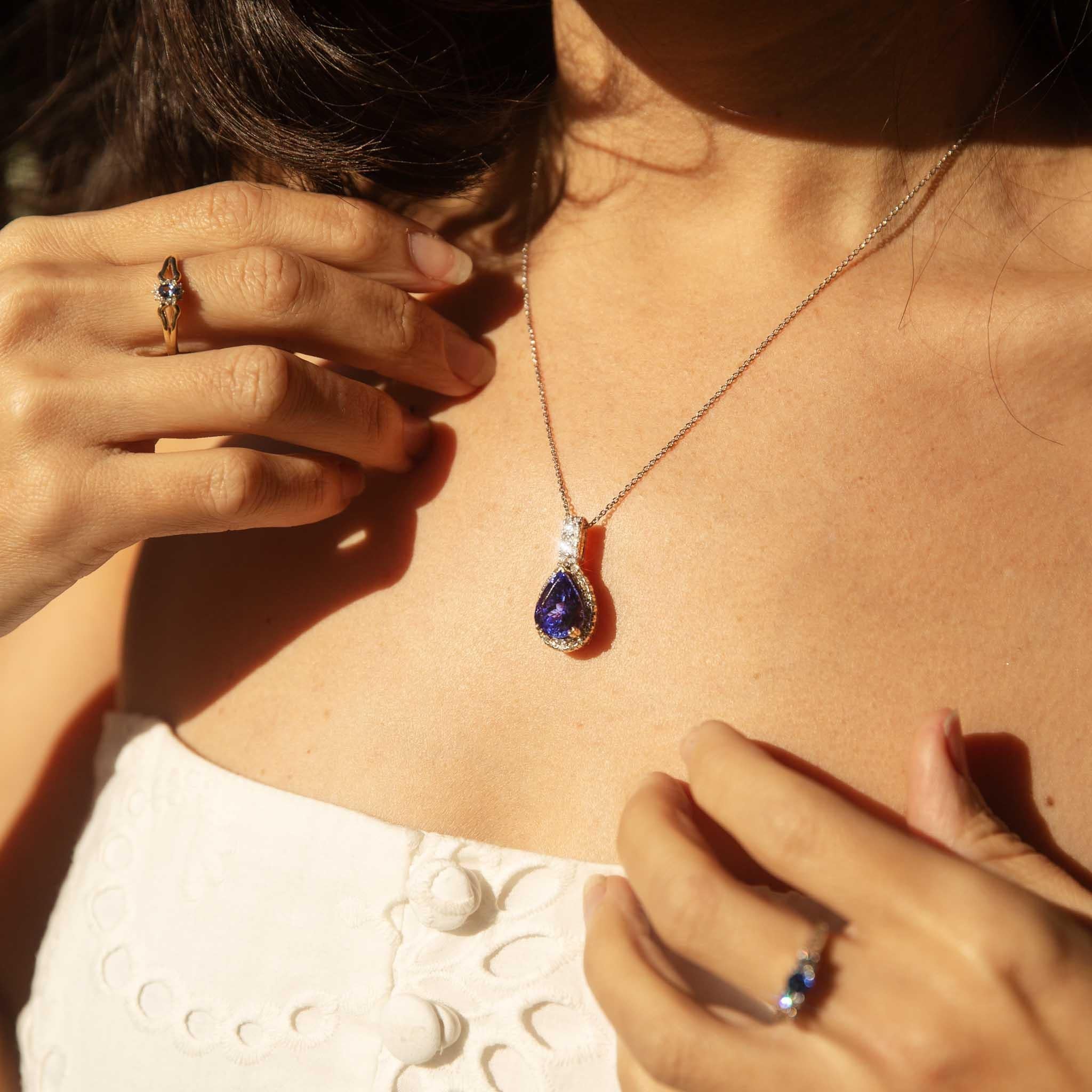Women's Vintage 1990s 7.1 Carat Purplish Blue Tanzanite & Diamond Pendant 14 Carat Gold