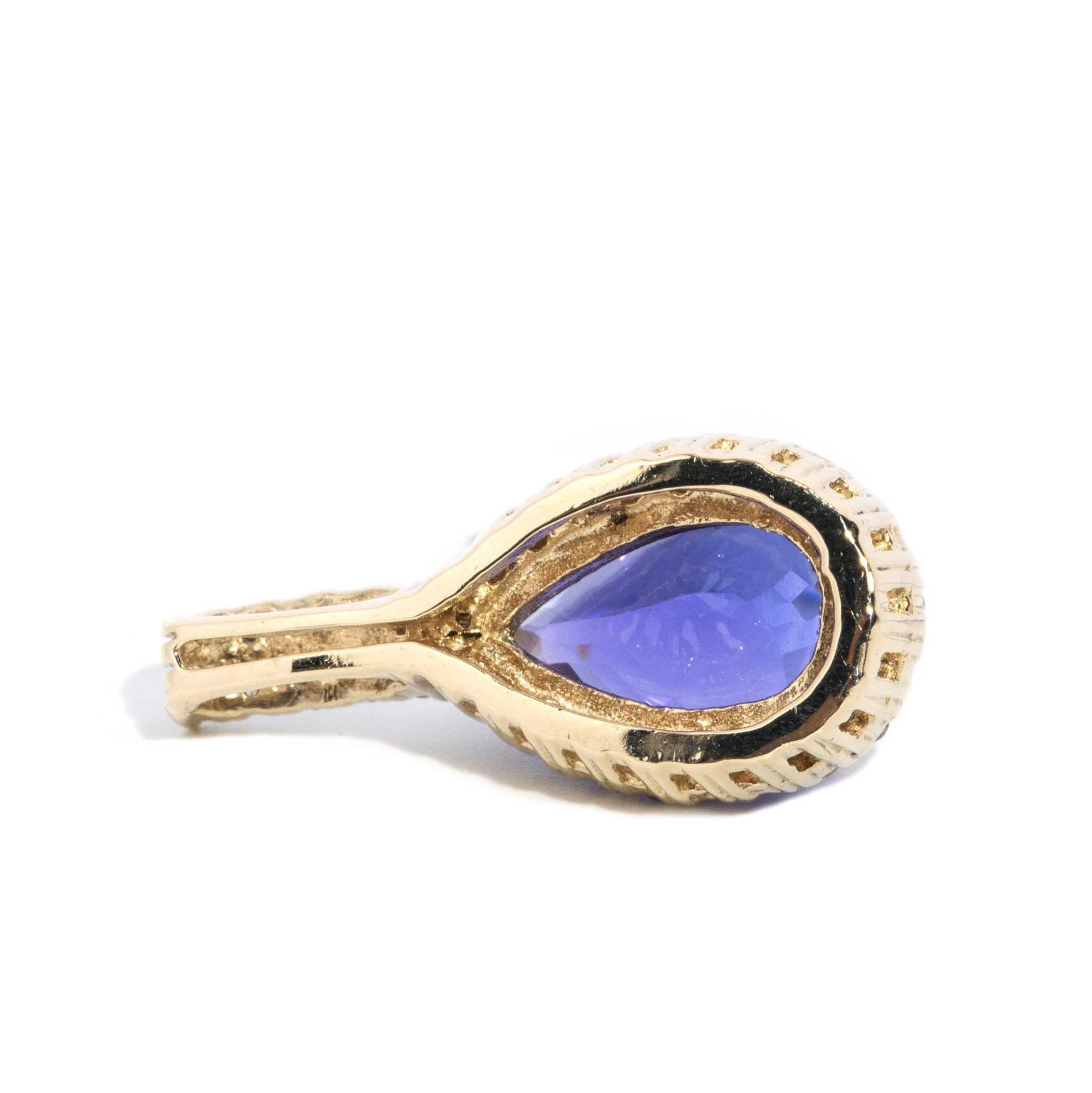 Vintage 1990s 7.1 Carat Purplish Blue Tanzanite & Diamond Pendant 14 Carat Gold 3