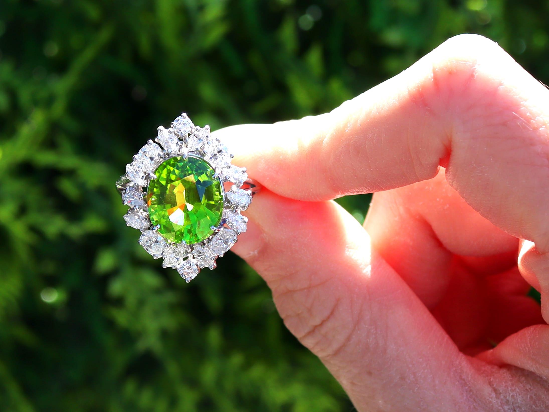 A stunning, fine and impressive vintage 7.20 carat peridot and 2.35 carat diamond, platinum dress ring; part of our diverse vintage collection of peridot jewellery.

This stunning, fine and impressive peridot ring has been crafted in platinum.

The