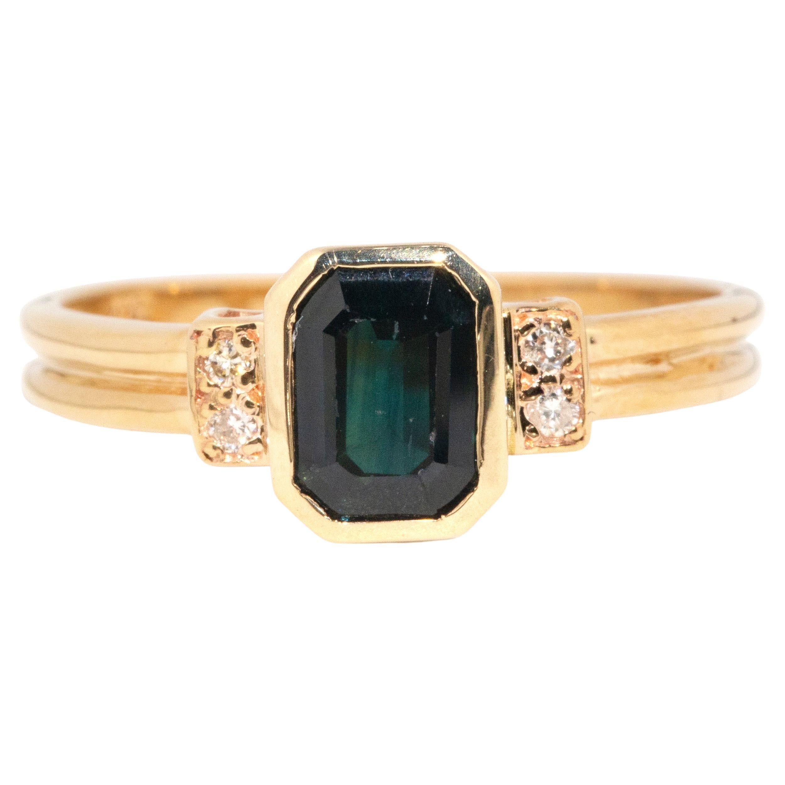 Vintage 1990s 9 Carat Yellow Gold Emerald Cut Teal Sapphire and Diamond Ring