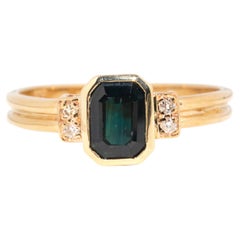 Vintage 1990s 9 Carat Yellow Gold Emerald Cut Teal Sapphire and Diamond Ring