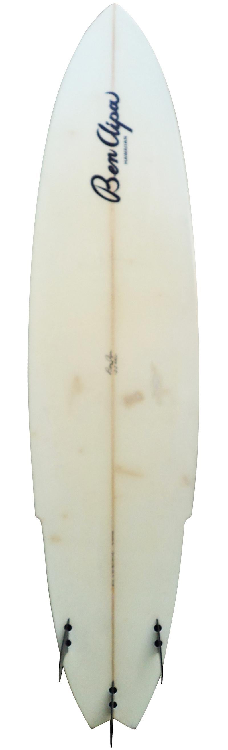 1998 Aipa surfboards sting thruster shaped by Ben Aipa in 1998. Features tapa style tribal art with turtles by Lokelani Aipa. This vintage surfboard remains in all original condition.

“Da Sting” as the Hawaiian's called it, was the first winged