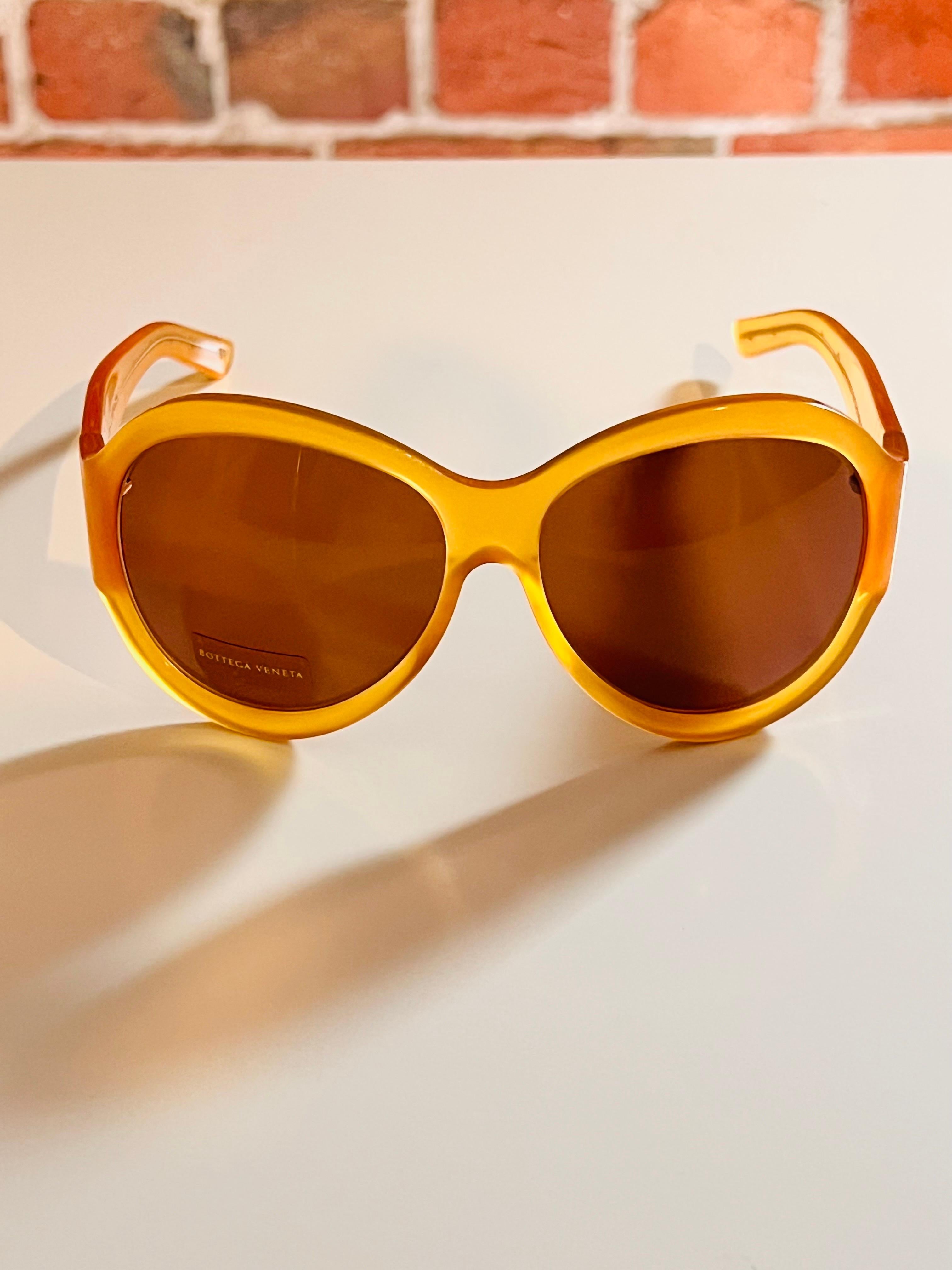 Vintage 1990s Bottega Veneta sunglasses in honey colour with butterfly detail 8