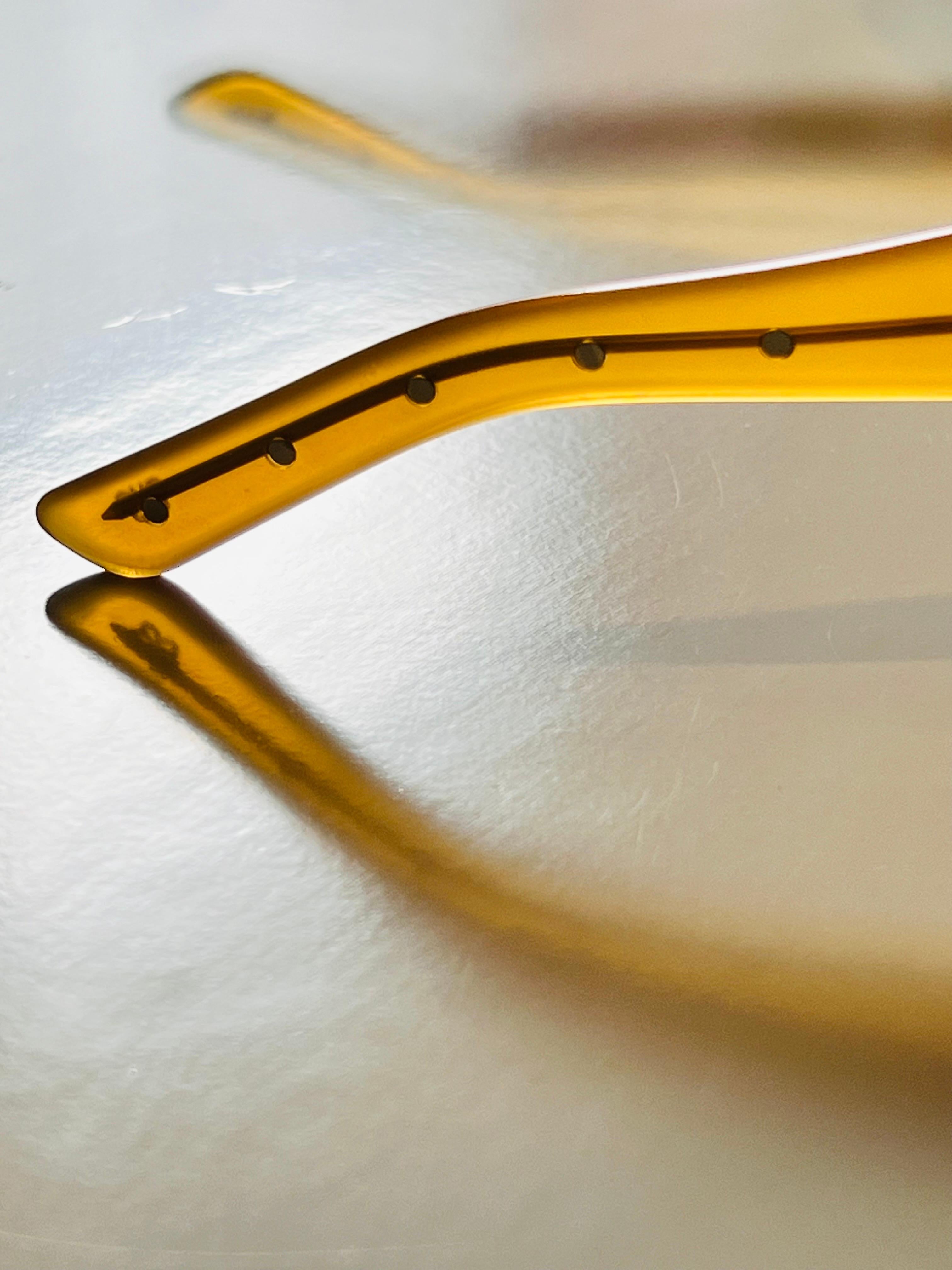 Vintage 1990s Bottega Veneta sunglasses in honey colour with butterfly detail 9