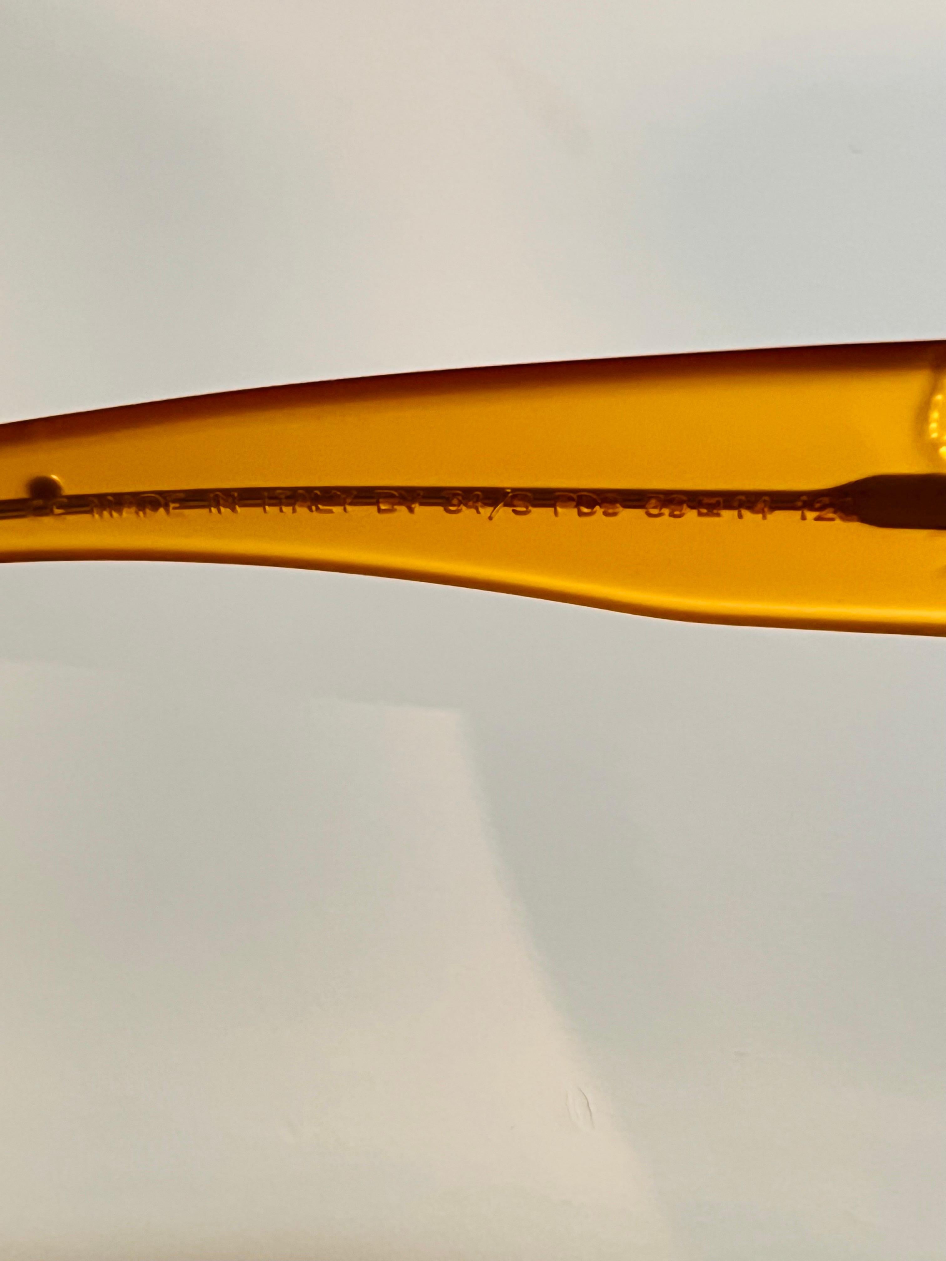 Vintage 1990s Bottega Veneta sunglasses in honey colour with butterfly detail 10