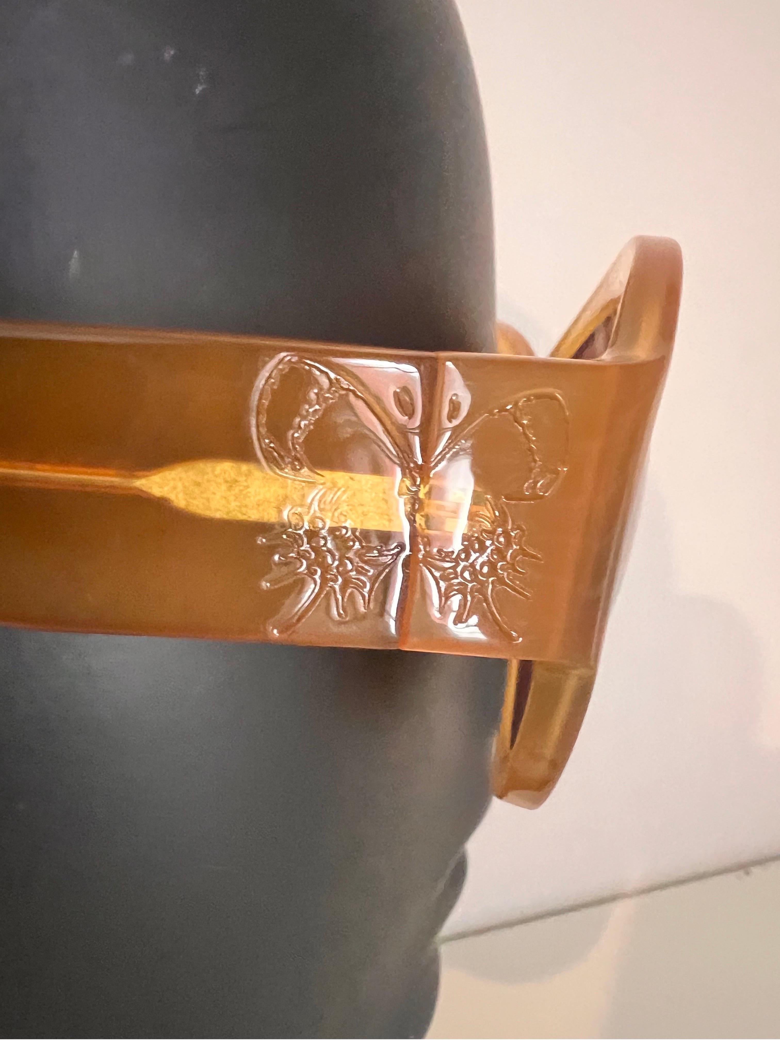 Vintage 1990s Bottega Veneta sunglasses in honey colour with butterfly detail 1
