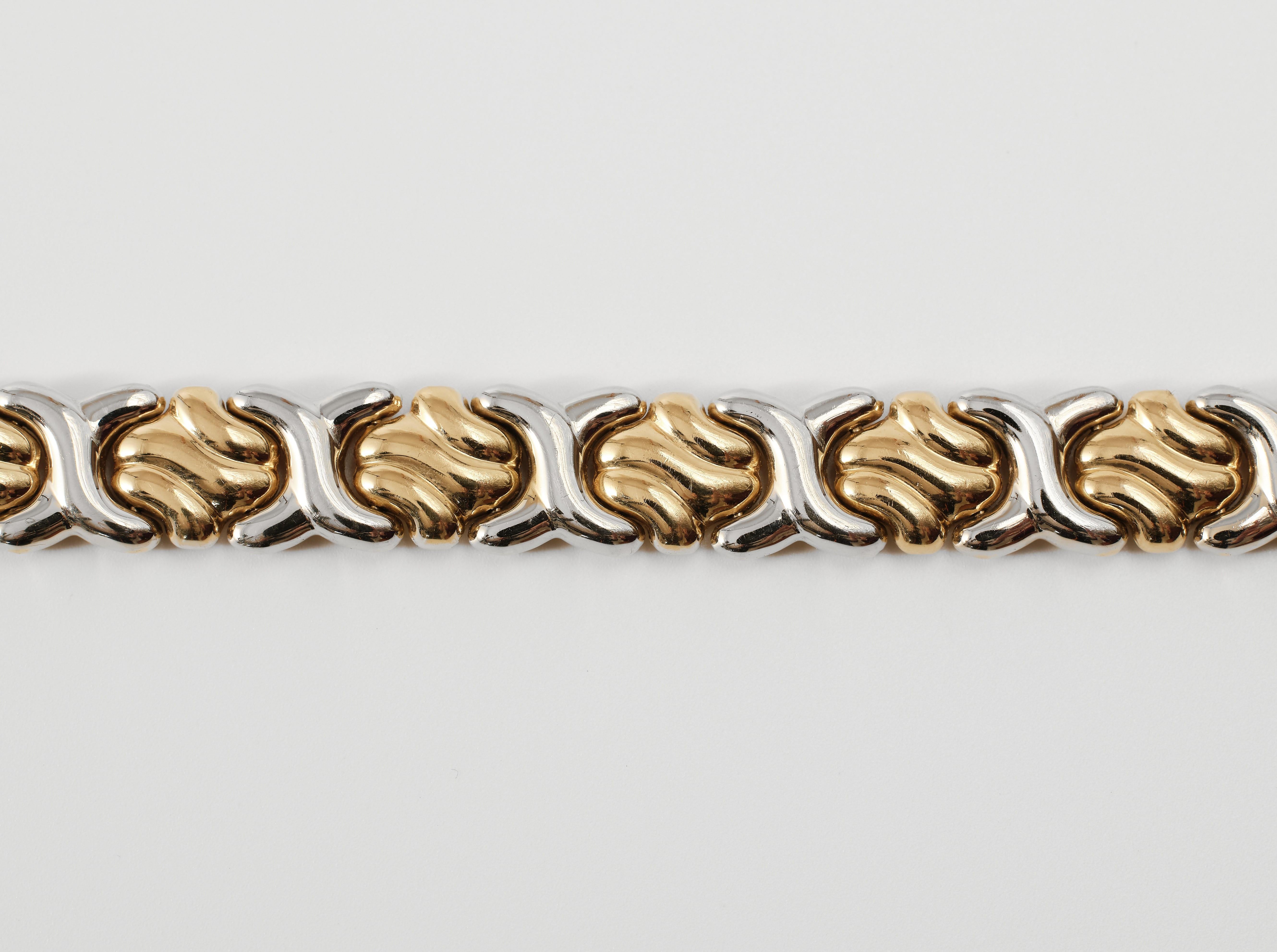 Modern Vintage 1990s Carl Bucherer link bracelet two color 18 karat gold For Sale