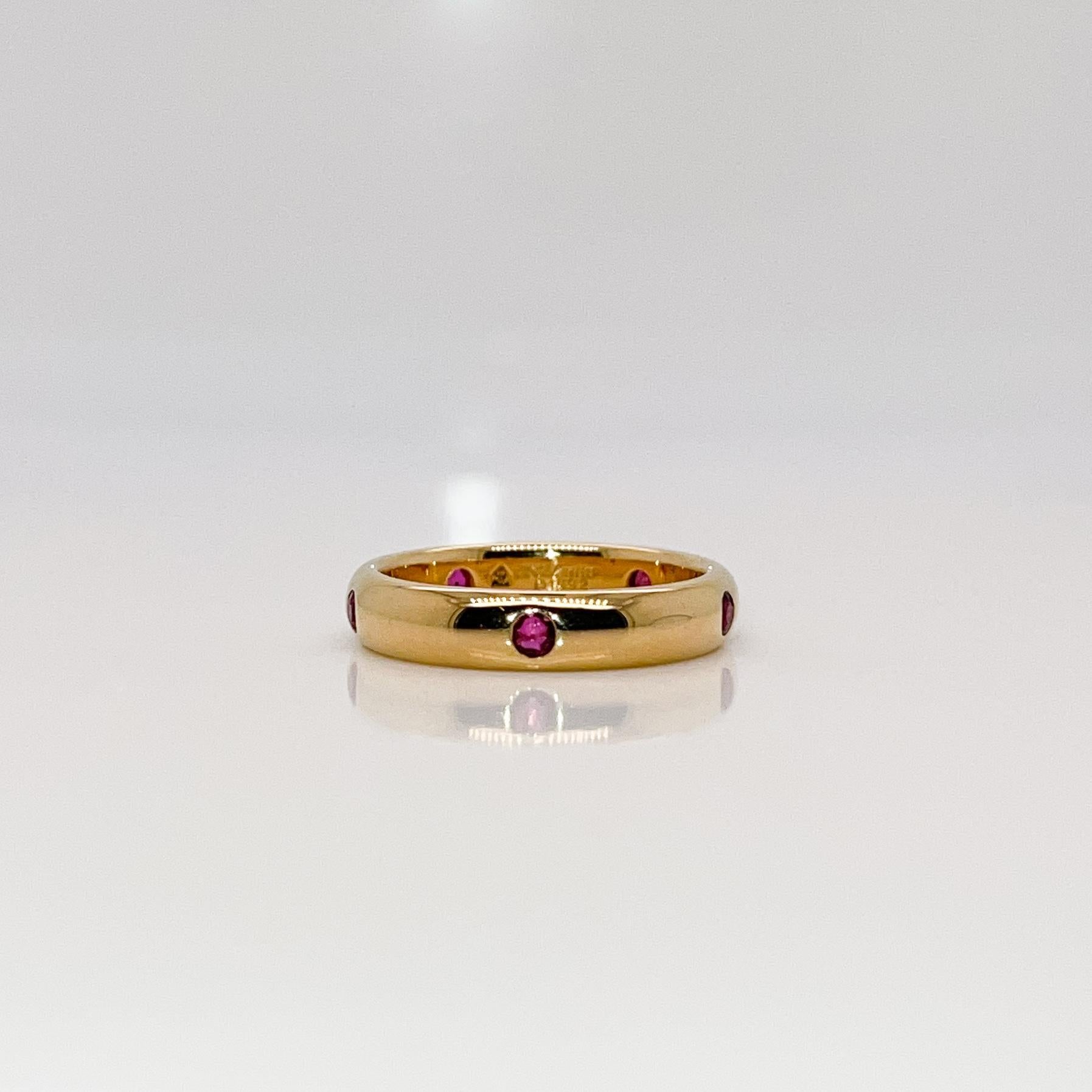 A very fine 'Stella' ring.

By Cartier.

In 18K yellow gold & flush set with round cut rubies.

Simply great design! 

Date:
20th Century

Overall Condition:
It is in overall good, as-pictured, used estate condition with some fine & light surface