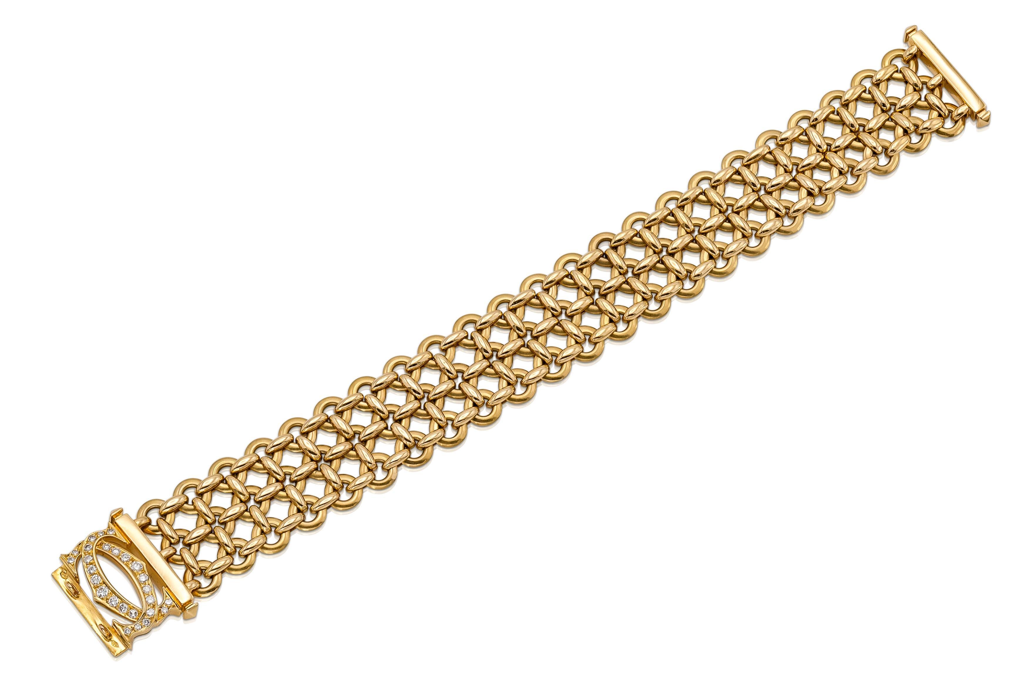 Finely crafted in 18k yellow gold with Round Brilliant cut Diamonds on the Double C Logo clasp.
Signed by Cartier, from their Penelope collection
Circa, 1990s
Size 7 inches