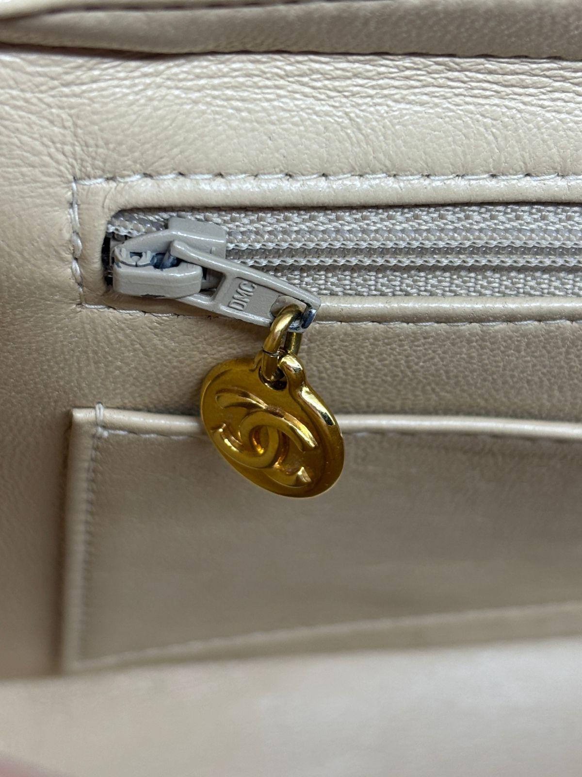 Vintage 1990s Chanel Beige Lambskin Quilted Medium Zip Flap Backpack For Sale 11