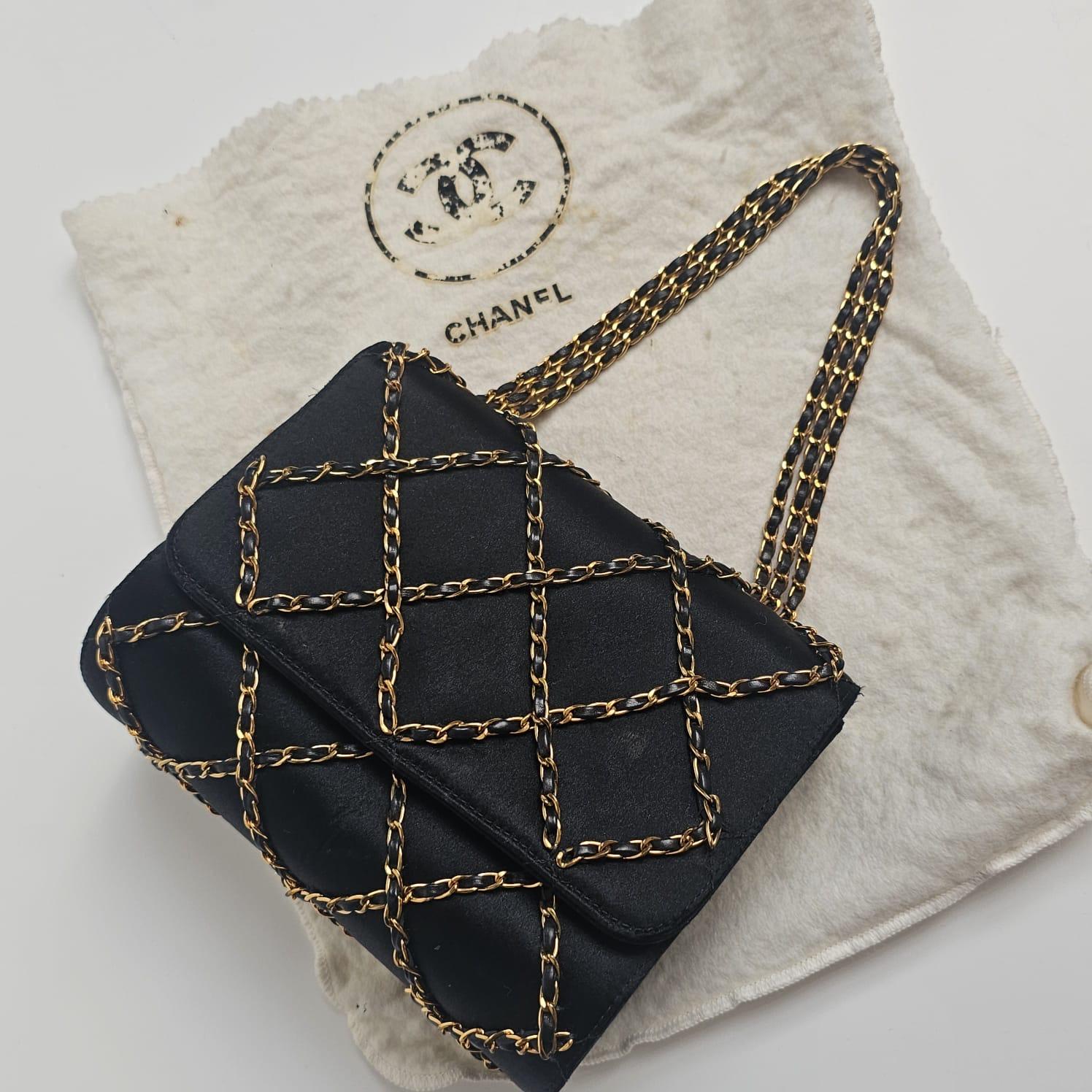 Rare vintage Chanel satin quilted evening bag. Unique and classy design. Minor scuff marks and rubbing on the satin especially the corners. Series #3. Gold leather lining. CC quilting on the sides. Comes with its holo and dust bag.