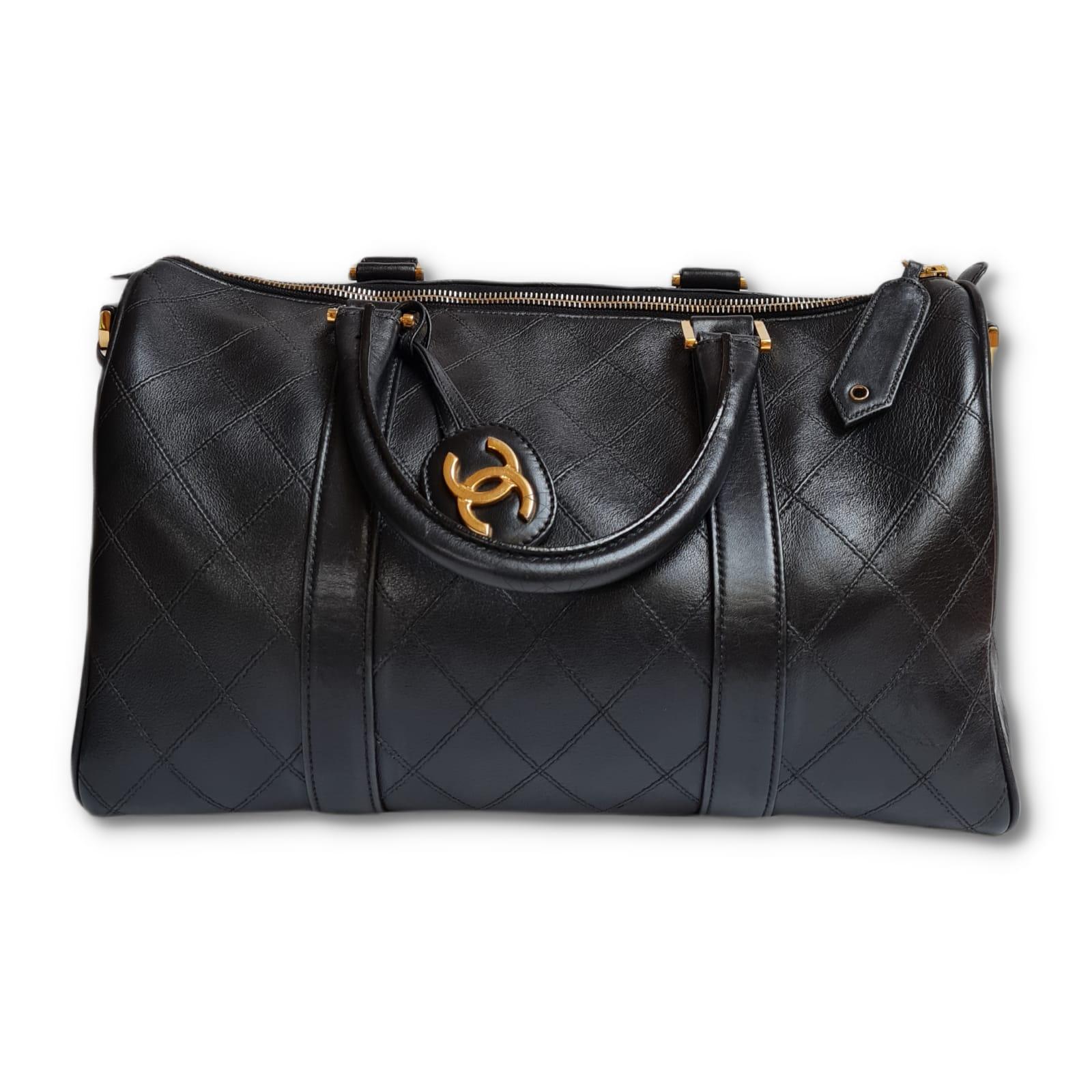 Beautiful chanel vintage boston bag in quilted leather. Overall in great condition, with minor touch ups on the corners. Item is missing its strap. Series #4. Comes as it is with its leather tag attached.