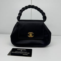 Vintage 1990s Chanel Black Satin Mini Twist Top Handle Purse