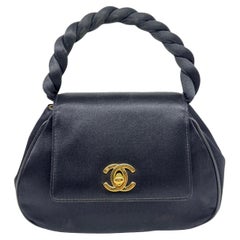 Vintage 1990s Chanel Black Satin Mini Twist Top Handle Purse