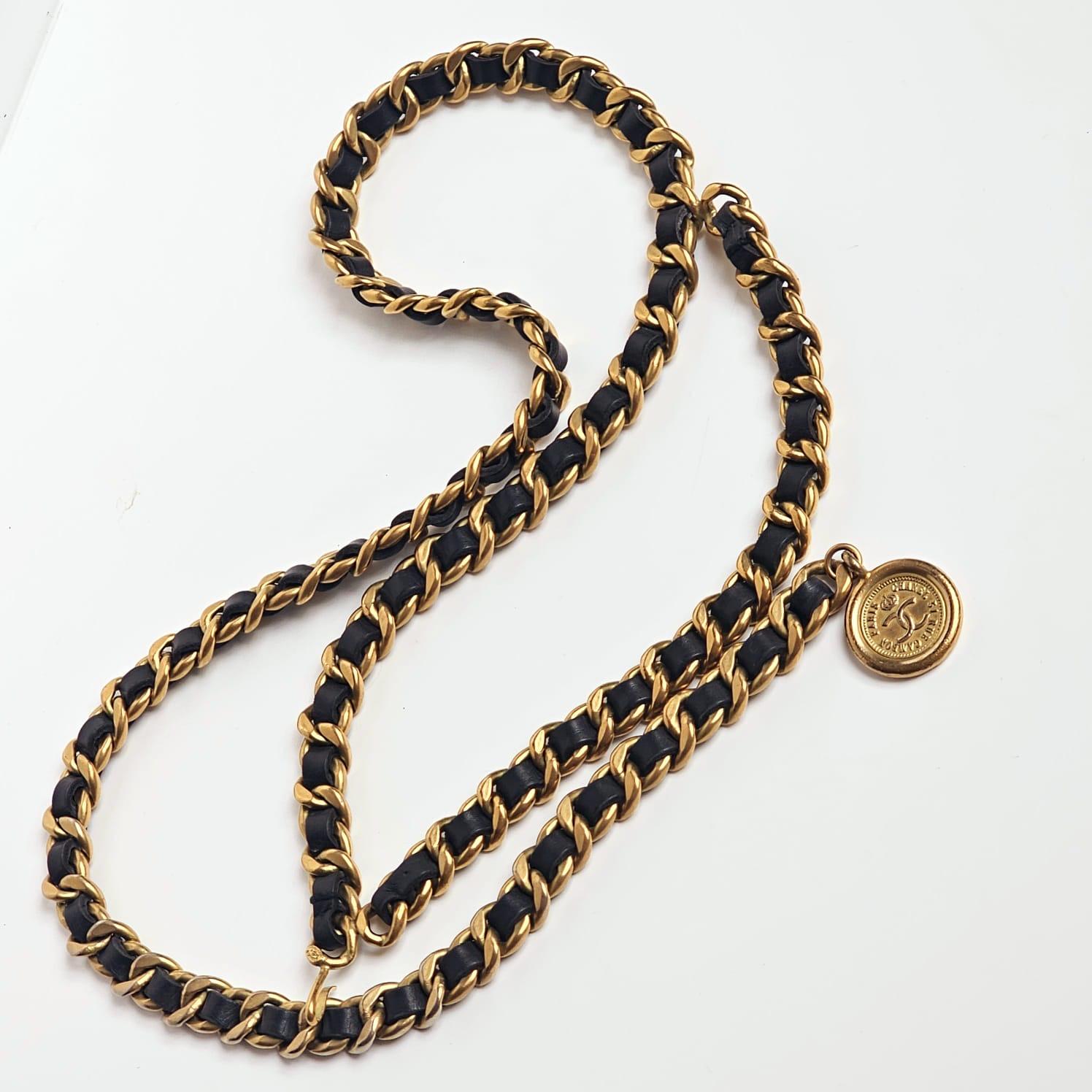 Iconic vintage 90s Chanel Layered Belt. Perfect accesories to add to elevate any look. Minor scuffing on the leather bits and tarnishing on the hardware. Comes as is. Length is 90 cm.