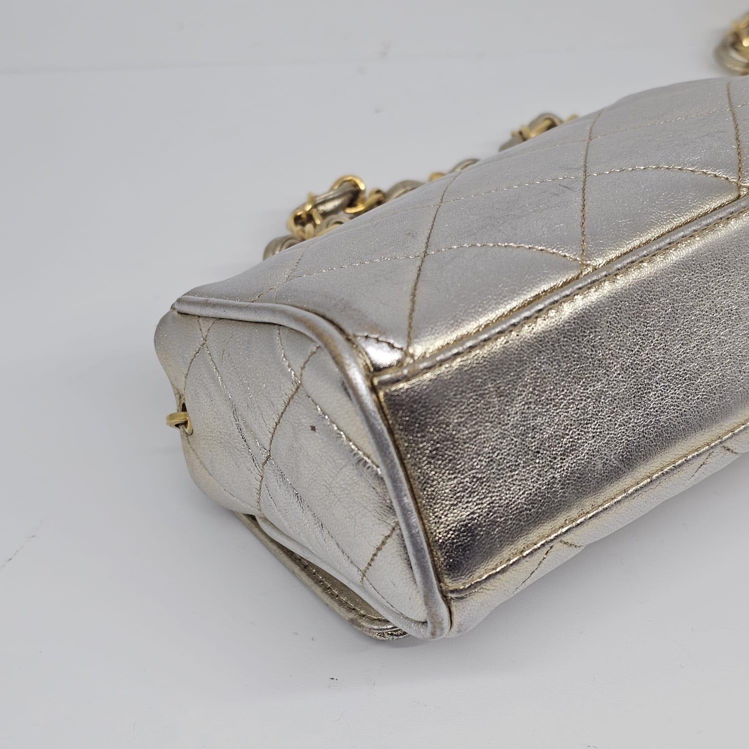 Vintage 1990s Chanel Extra Mini Silver Metallic Flap Bag. 9