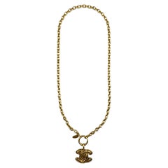 Vintage 1990s Chanel Gold Quilted CC Logo Pendant Necklace