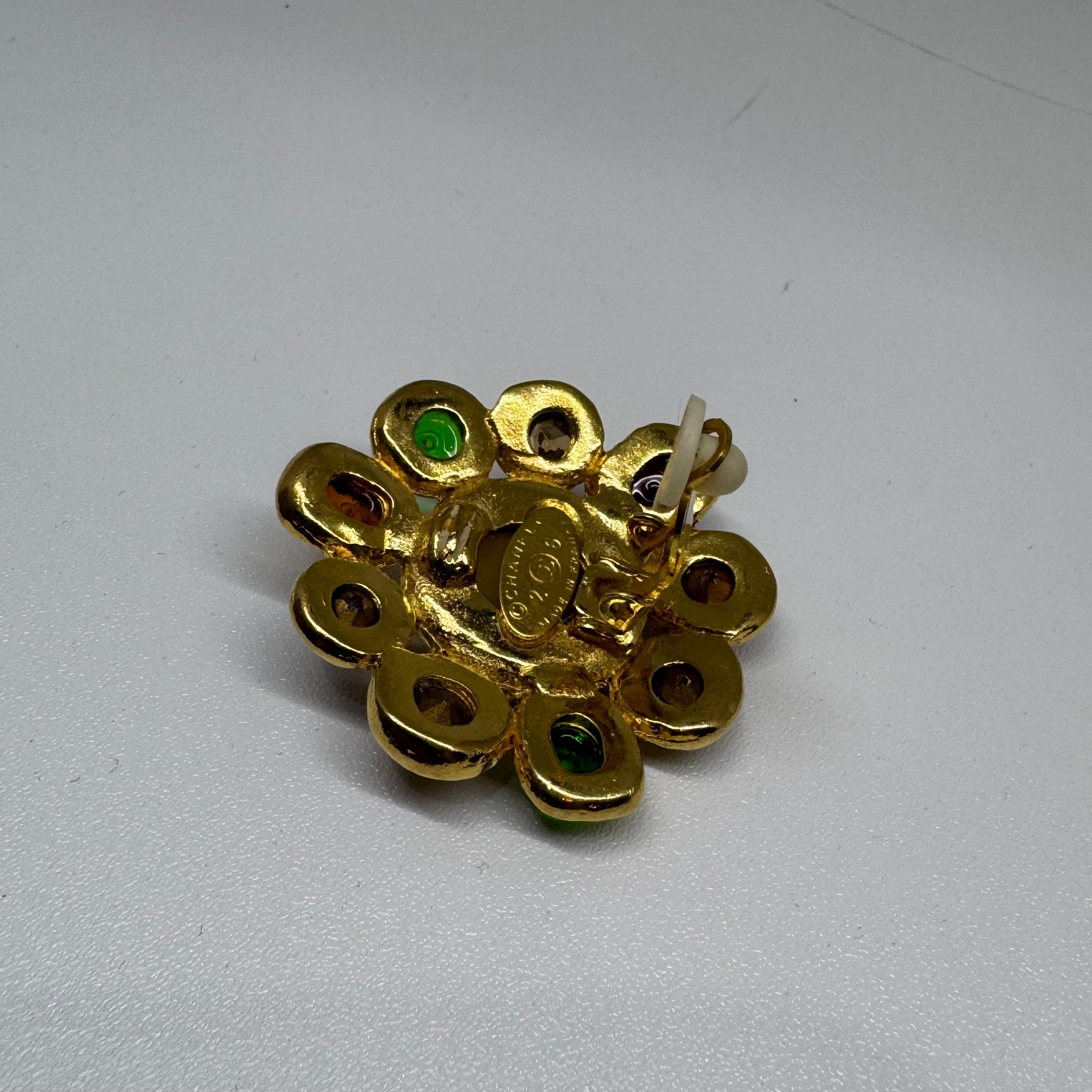 Vintage Chanel gripoix multicolor gems clip on earrings. Beautiful statement piece. Overall in very good vintage condition. Minor tarnishing on the hardware.