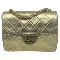 Vintage 1990s Chanel Metallic Gold Quilted Mini Square Flap Bag