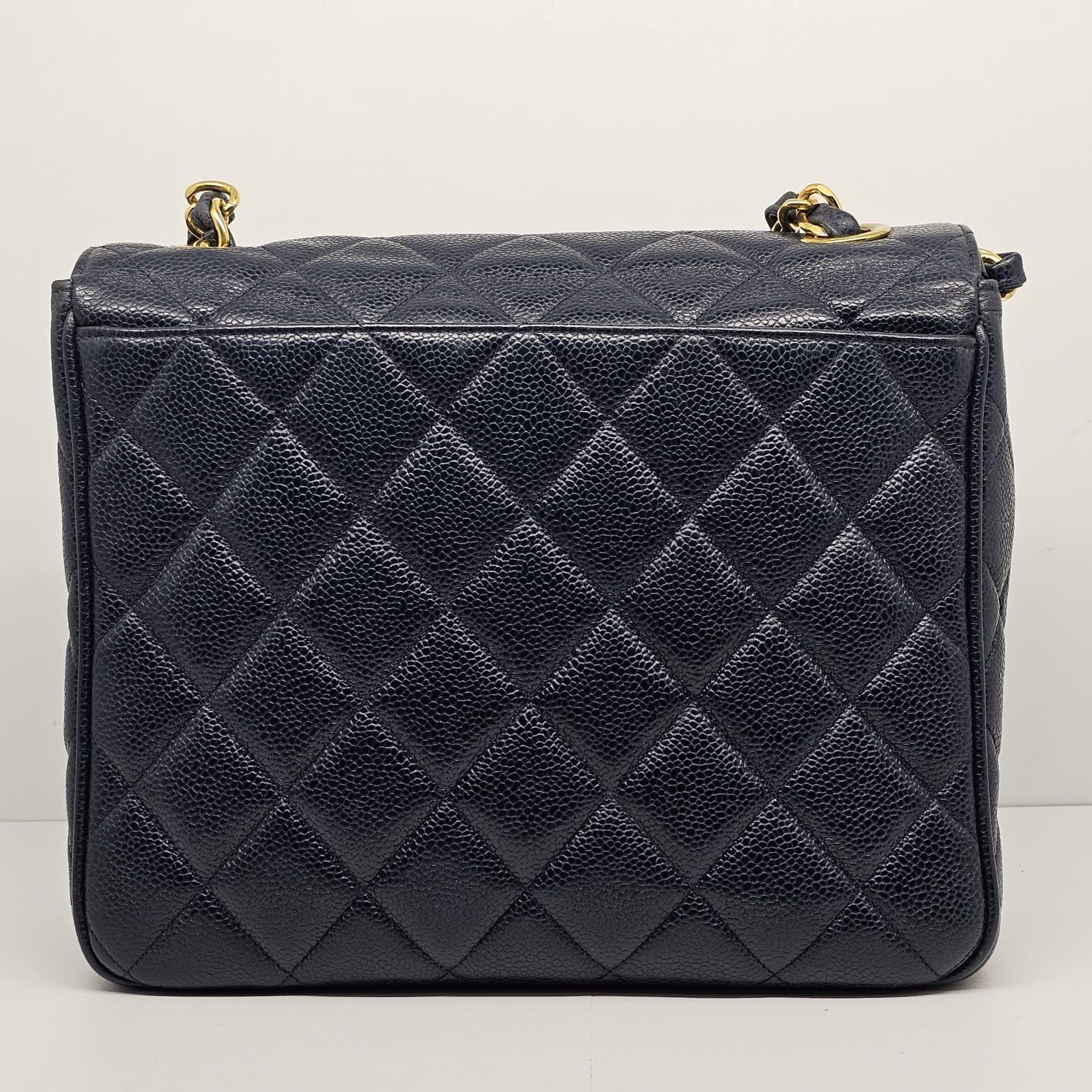 Women's or Men's Vintage 1990s Chanel Navy Caviar Quilted Square Flap Bag