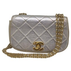 Vintage 1990s Chanel Silver Multi Chain Mini Flap Bag Vintage 1990s Chanel Silver Multi Chain Mini Flap Bag