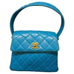 Vintage 1990s Chanel Turquoise Lambskin Quilted Mini Top Handle Flap Bag