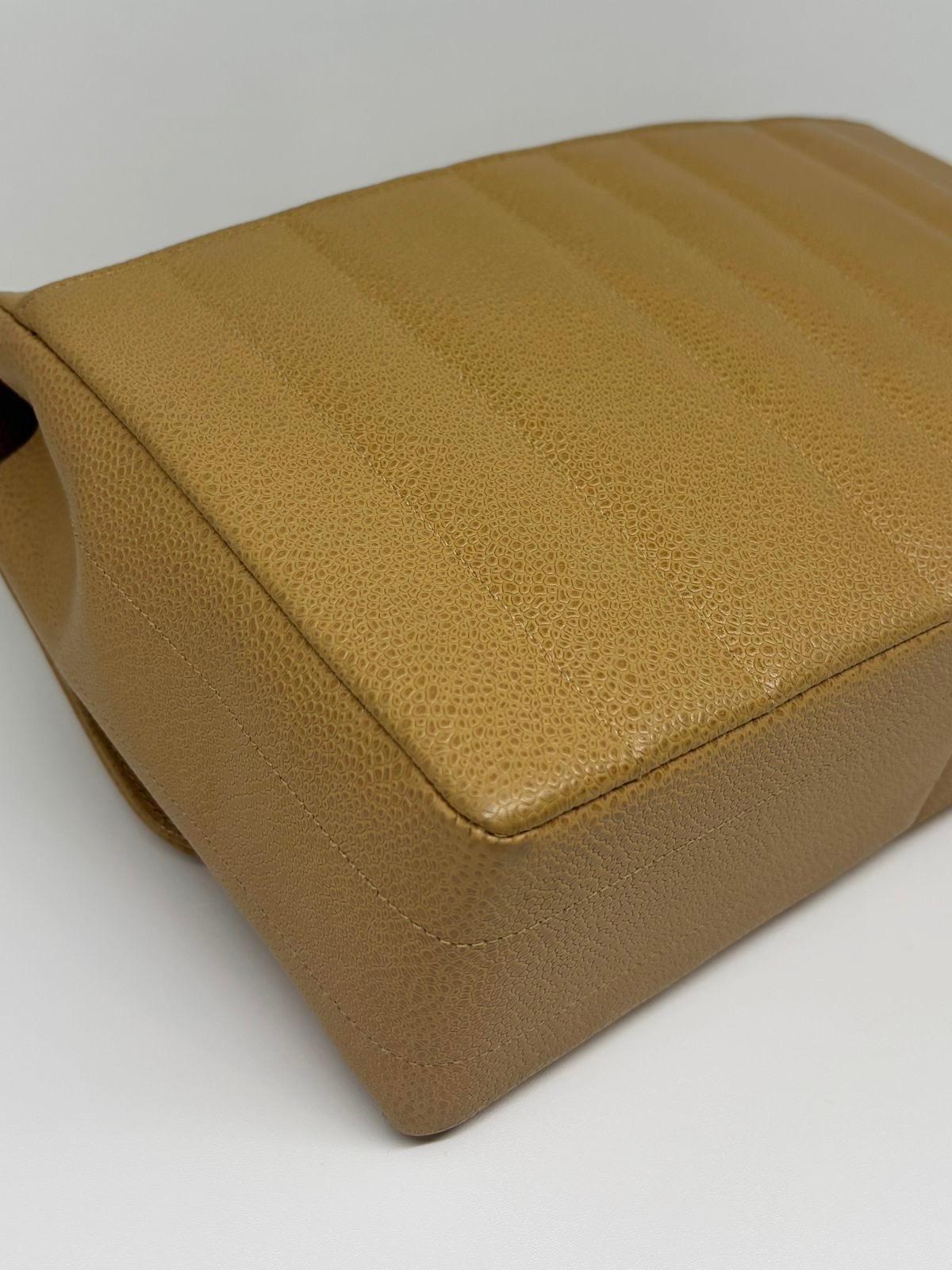 Brown Vintage 1990s Chanel Vertical Quilt Caramel Caviar Flap Bag