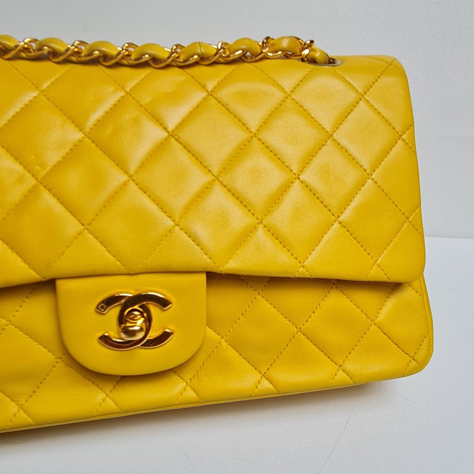 Rare classic lambskin vintage chanel in medium size with gold hardware. Overall in great vintage condition with light dents and marks on the leather surface and corners, but nothing significant. Comes with its holo only. 