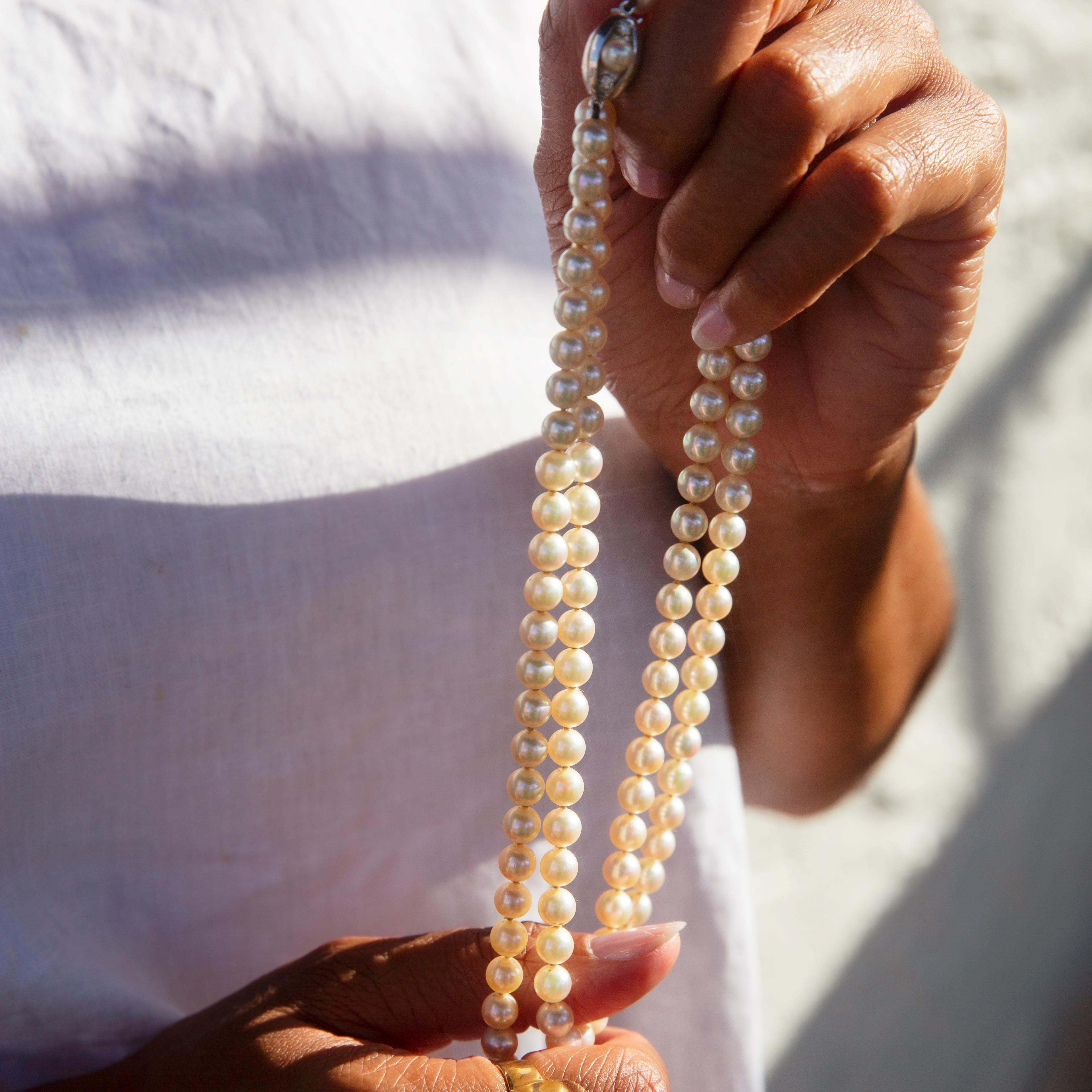 Thoughtfully strung together, this gorgeous strand of round cream-coloured cultured pearls pulsates with high lustre. We have named this stunningly elegant piece The Ziyi Necklace. Lovely for wearing any time or place, she is finished with a lovely