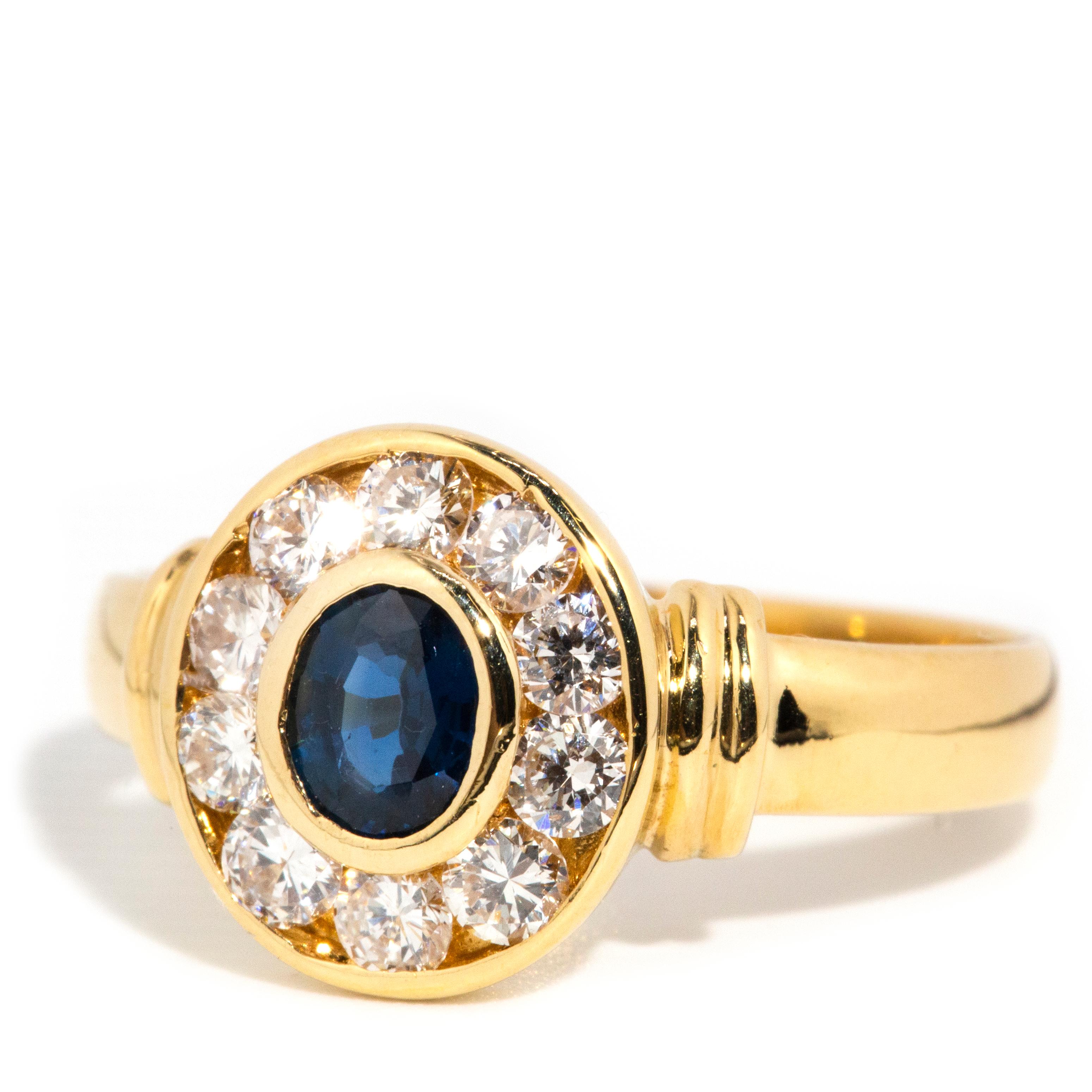 Modern Vintage 1990s Deep Bright Blue Sapphire & Diamond Halo Ring 18 Carat Yellow Gold