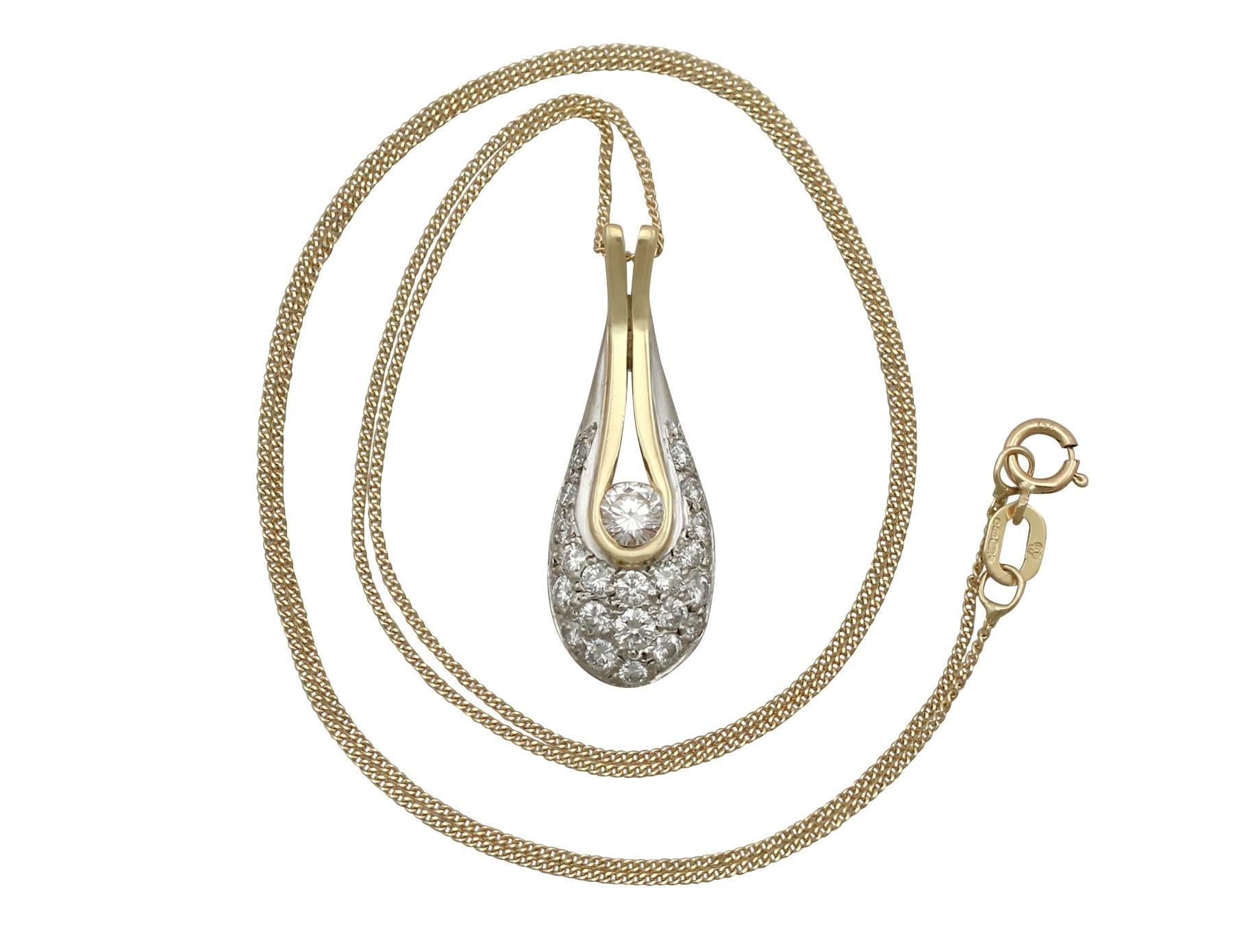 An impressive vintage 0.93 carat diamond, 18 karat yellow gold and 18 karat white gold 'teardrop' pendant; part of our diverse vintage jewelry collections.

This fine and impressive diamond teardrop pendant has been crafted in 18k yellow gold and