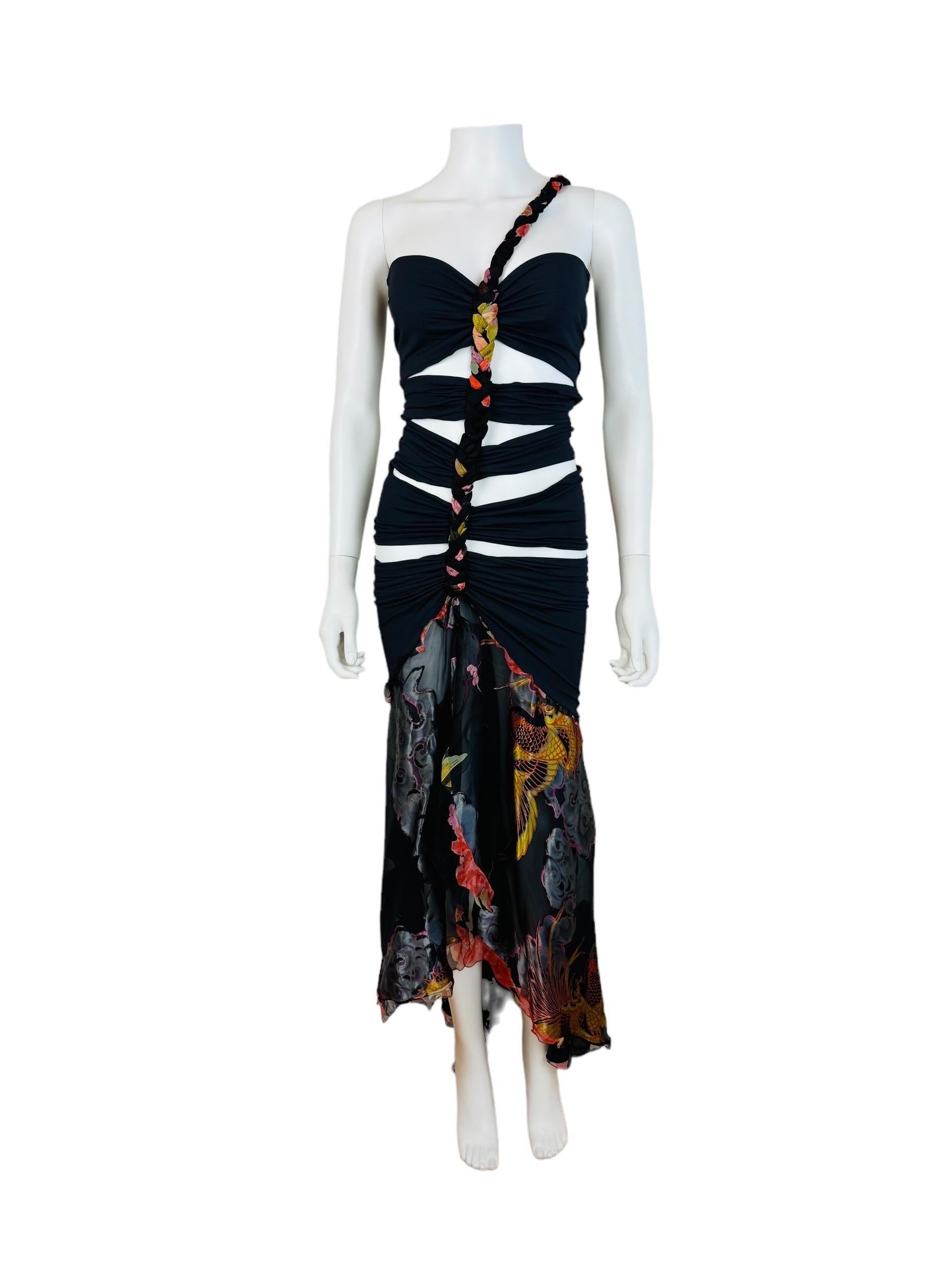 Vintage 1990s Emanuel Ungaro Dress
One shoulder style with braided fabric shoulder detail that runs down the front of the dress on the diagonal
Fitted bodice with horizontal cut outs
Stretch fabric at the hips
Cut out at the lower back
Skirt is