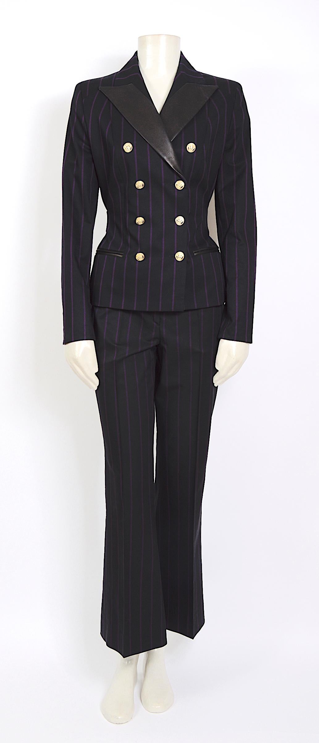 Vintage 1990s Gianni Versace purple striped black suit. made in a mix of 57% wool 42% silk & 2% elastane and leather details at the back/sleeves/collar and the waistband of the trousers The leather backstrap was pinned on the doll for a more fitted