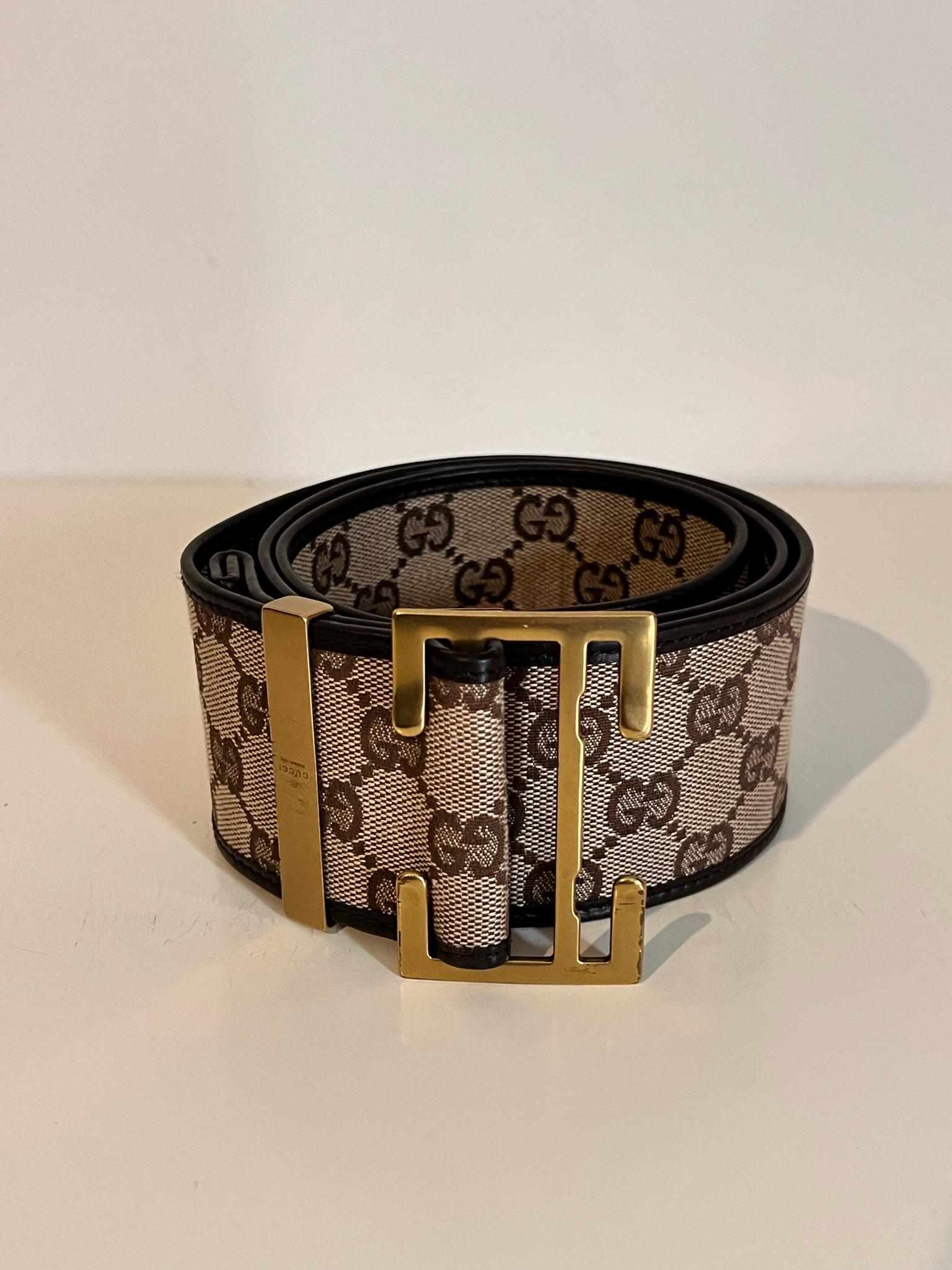 A 1990’s GUCCI  monogram GG canvas and leather belt with unique gold cut out buckle. some signs of wear consistent with age and use. 


A super special piece

Made in Italy