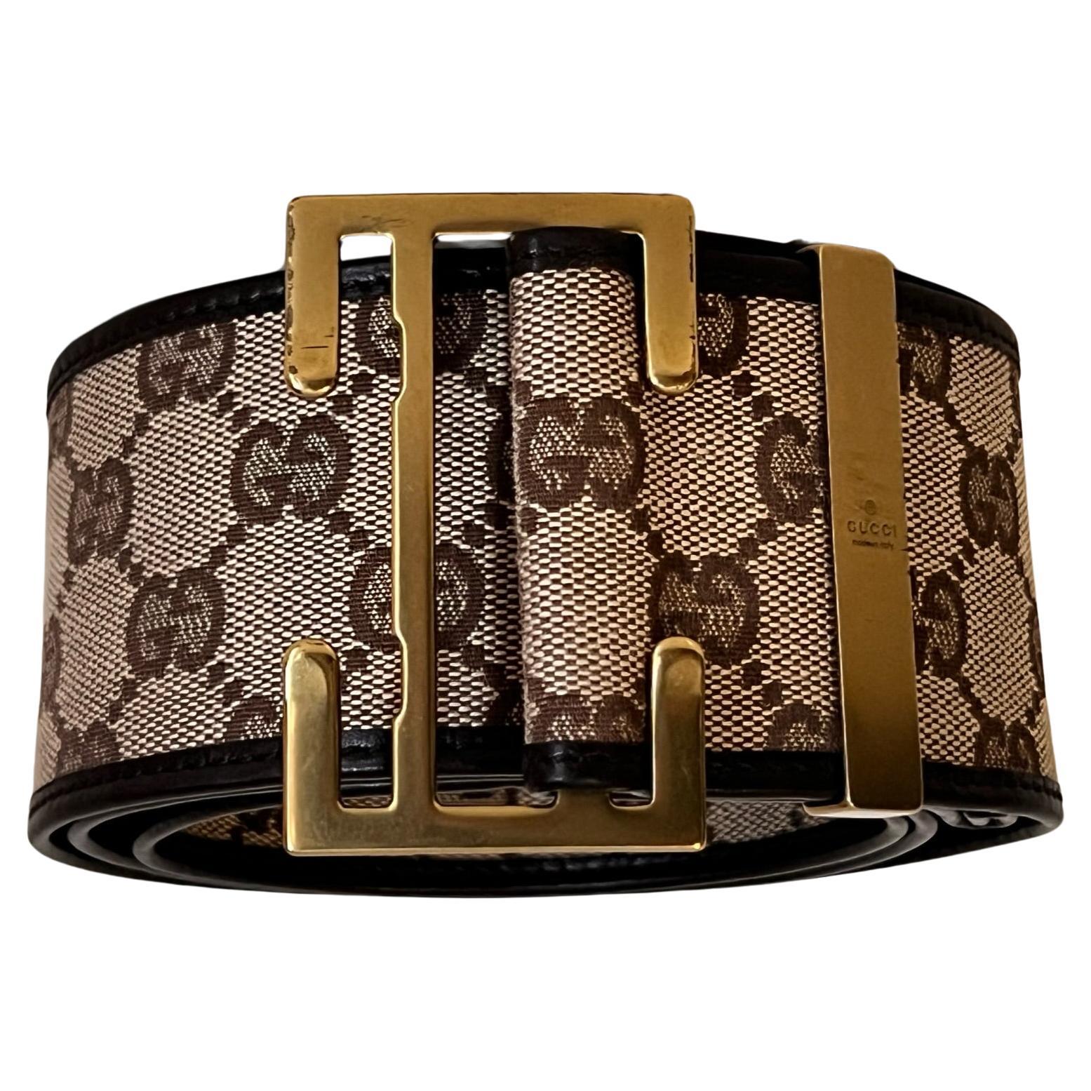 Vintage 1990’s GUCCI monogram GG canvas and leather belt with unique gold buckle