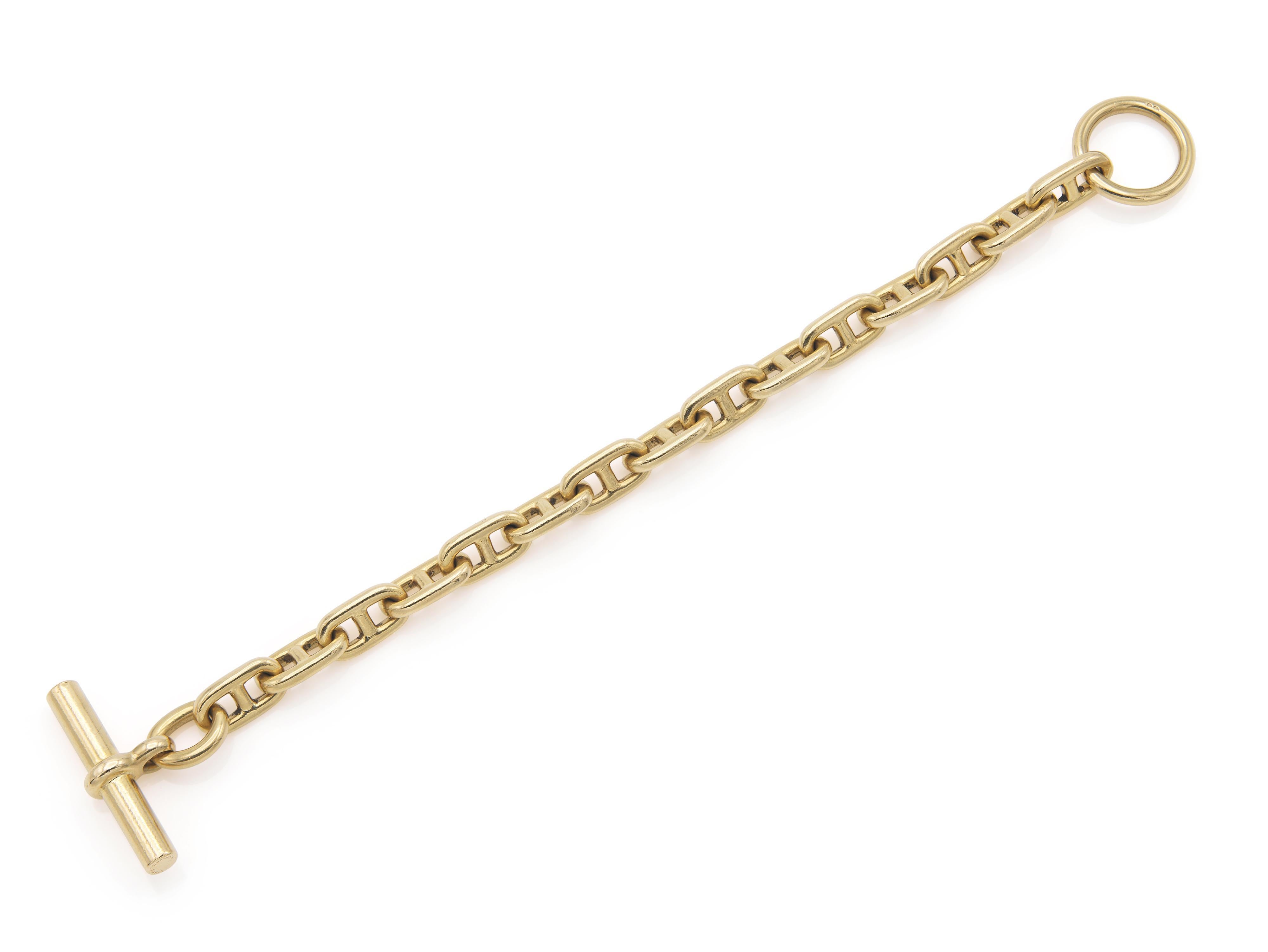 Finely crafted in 18k yellow gold.
Signed by Hermes
Circa 1990s
Size 7 1/2 inches