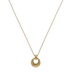 Vintage 1990's Hermès Open Circle Pendant Necklace in Yellow Gold