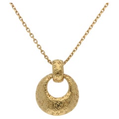 Vintage 1990's Hermès Open Circle Pendant Necklace in Yellow Gold