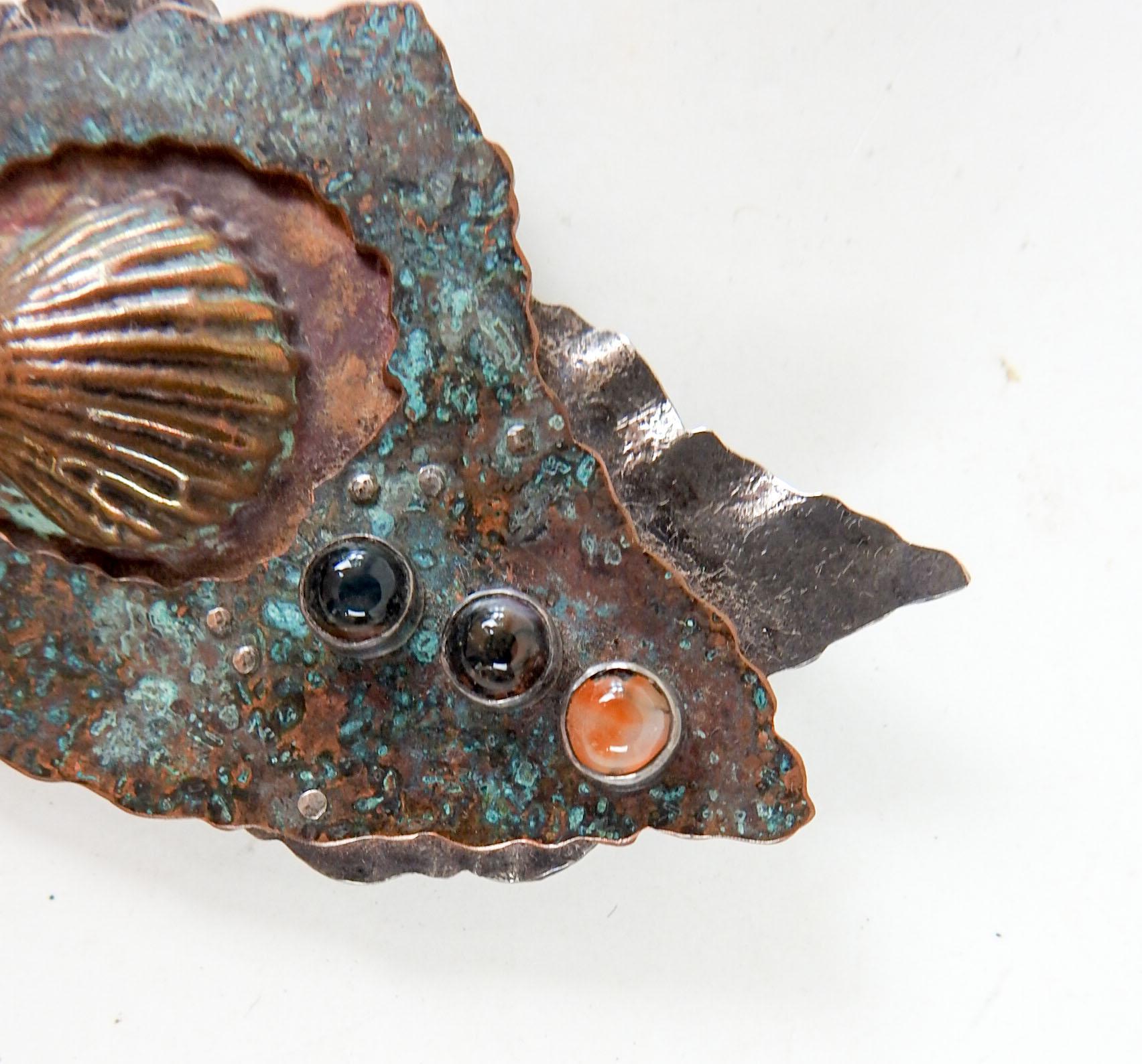 Large one of a kind circa 1990's artist made sterling silver and patinated copper brooch. Signed Linda Thompson (20th/21st century). Artistic dimensional copper relief shell with custom copper verdigris patina overlay, textured sterling silver