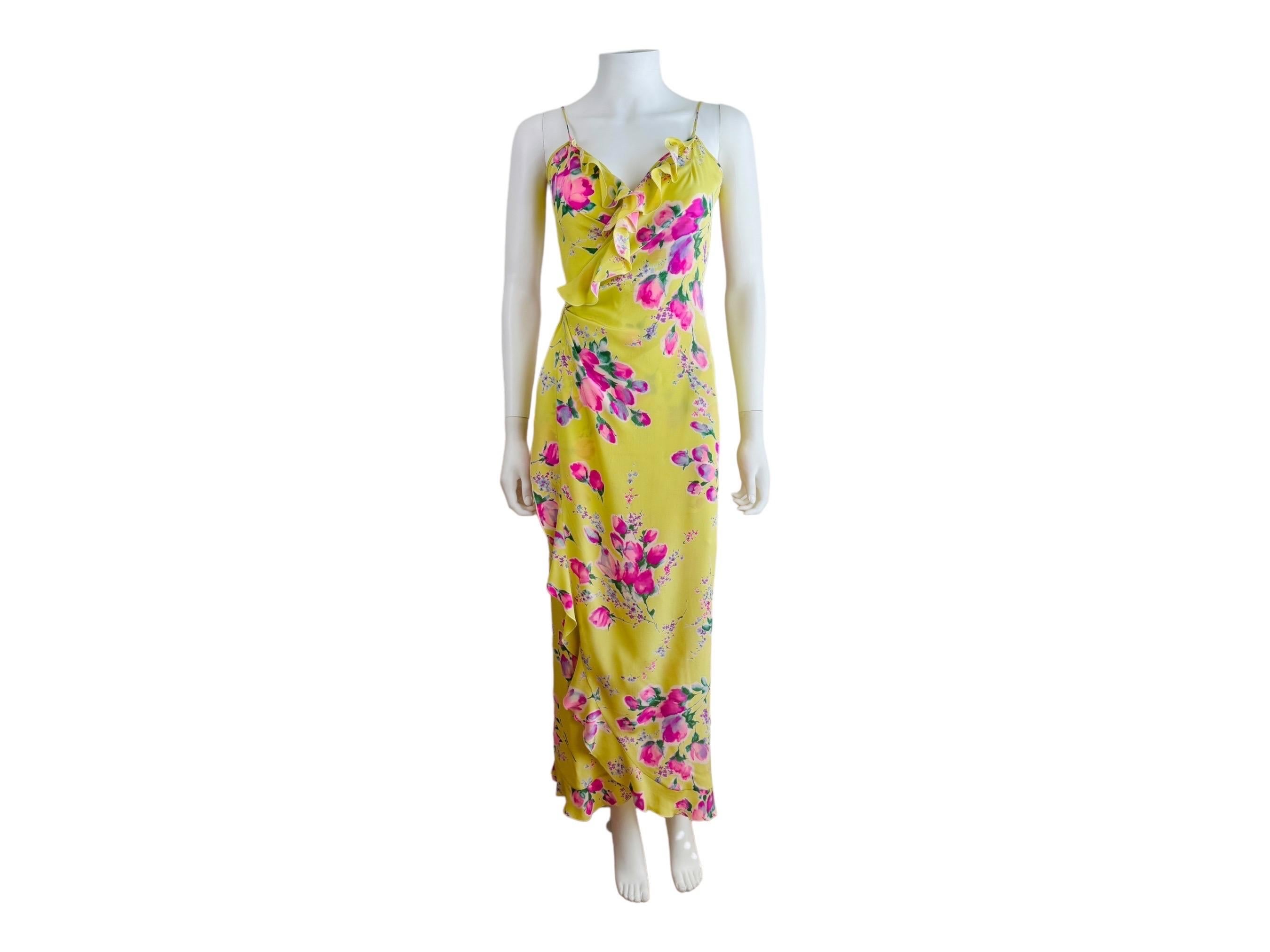Vintage Early 90s Emanuel Ungaro Dress 
Lemon yellow silk fabric with pink roses flowers
Thin shoulder straps
V neckline trimmed in ruffle fabric
Wrap style dress with long ties that tie at the waist
Ruffle detail down the front of the dress + at