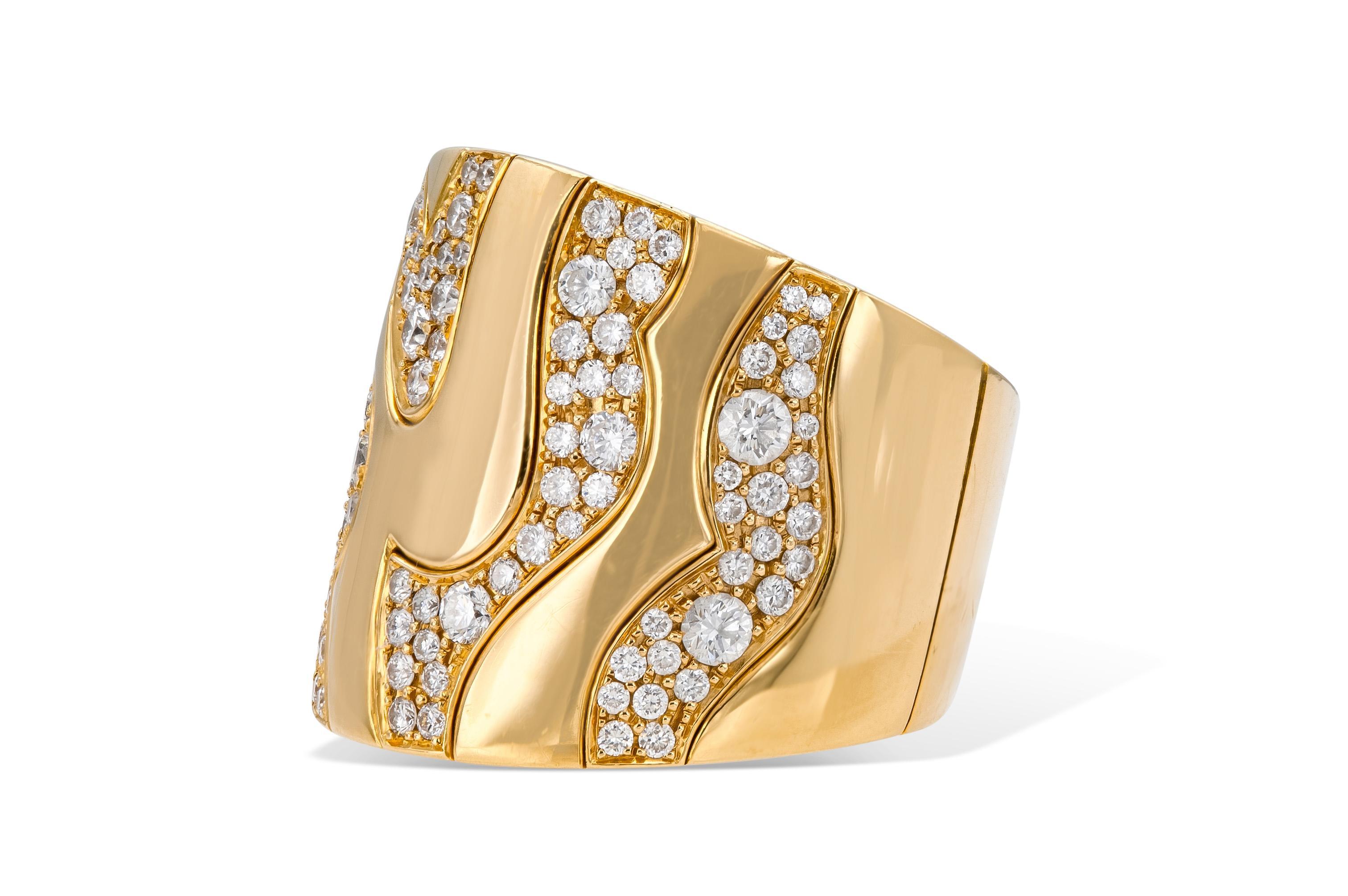 Finely crafted in 18k yellow gold with Round Brilliant cut Diamonds.
Signed by Marina B
Size 7
7/8 inch wide