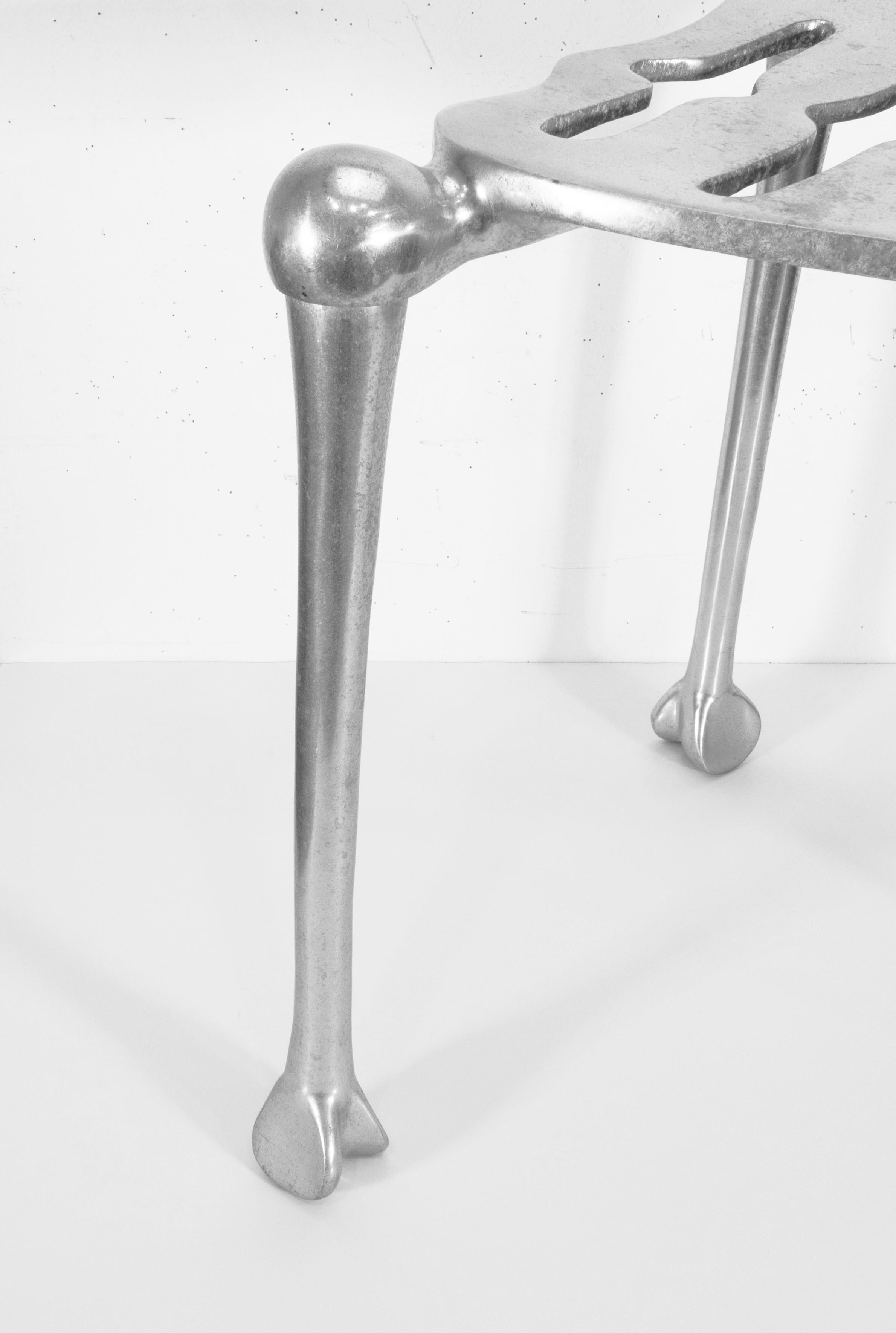 A vintage 1990s Michael Aram skeleton chair. This sculptural accent chair is from Michael Aram's 