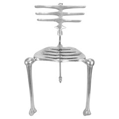 Silla de centro esqueleto de metal vintage años 90 firmada por Michael Aram Flights of Fancy