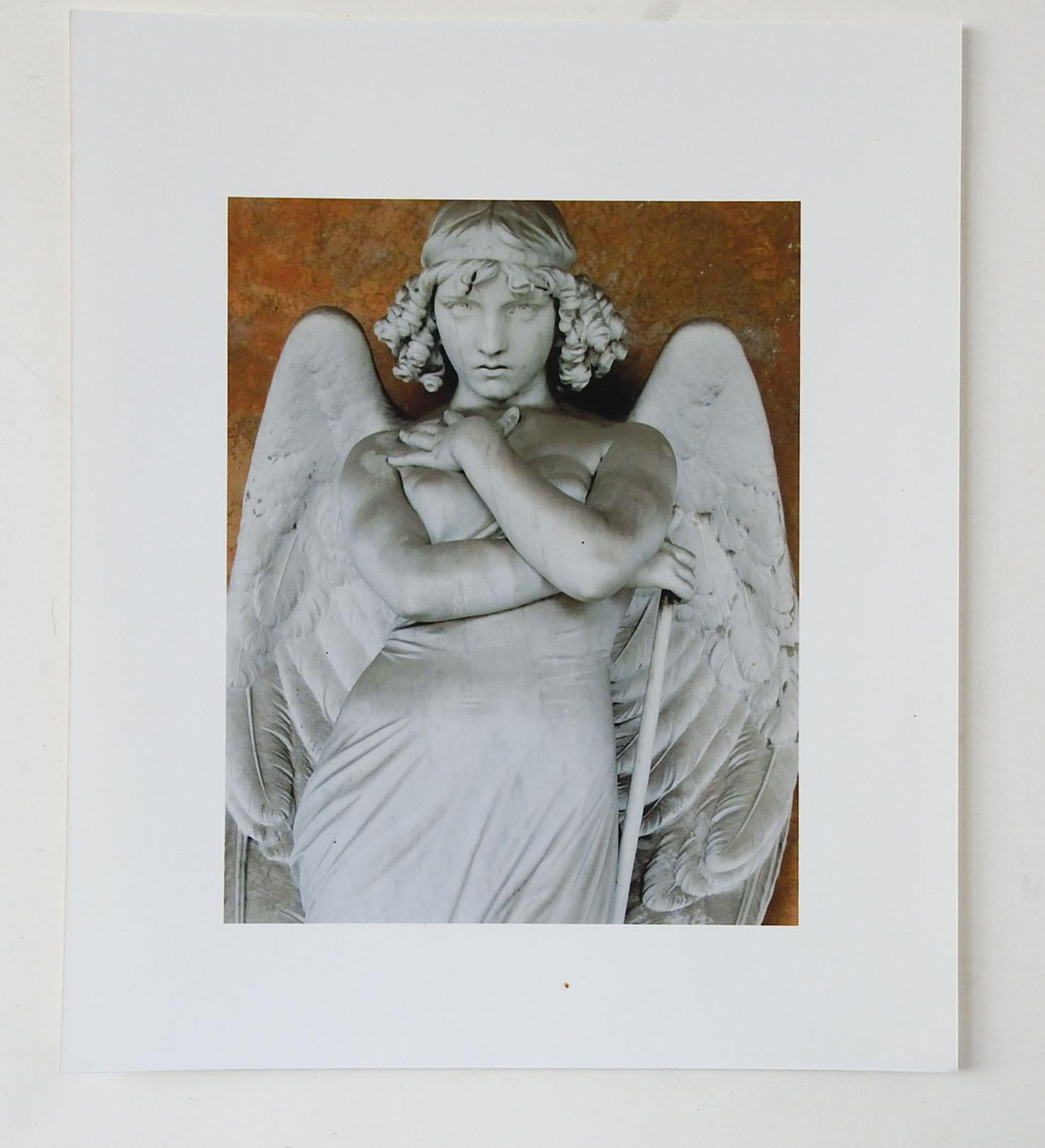 Vintage color photograph on paper by Eric C. Weller (20th century) Texas. Monteverde Angel sculpture. Unsigned, glossy finish, Eric Weller was a professor of photography at Texas State University, from the artists estate. Unframed.
