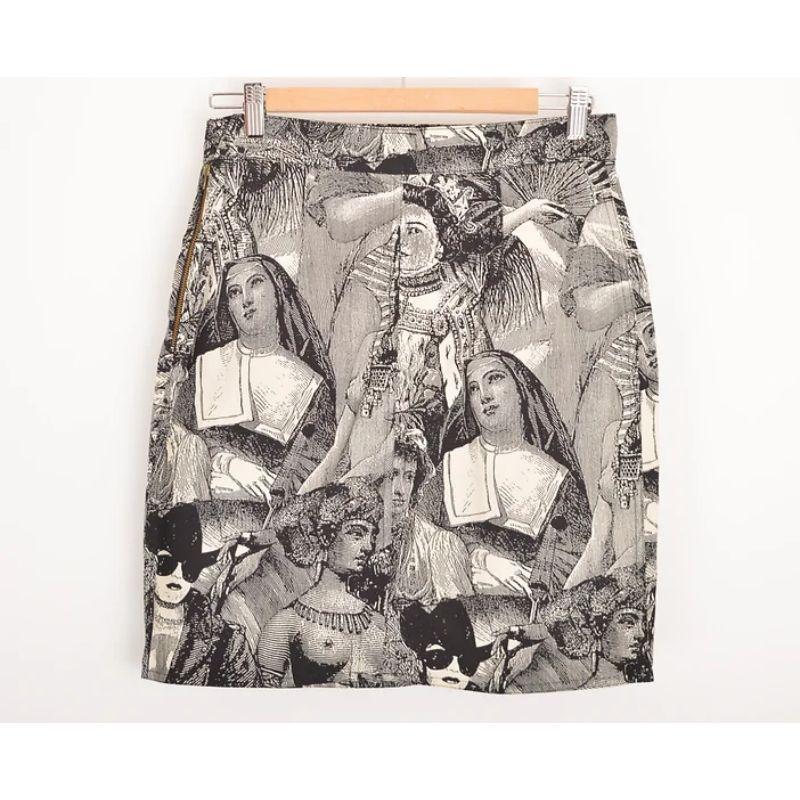 Vintage 1990s Moschino High waisted Mini skirt, made from denim cotton material, depicting an incredible pattern of Antique female figure etchings from around the world. 

Please Note we also have other Matching items from this very same collection
