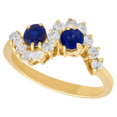 Vintage 1990s Sapphire and Diamond 18K Gold Twist Ring